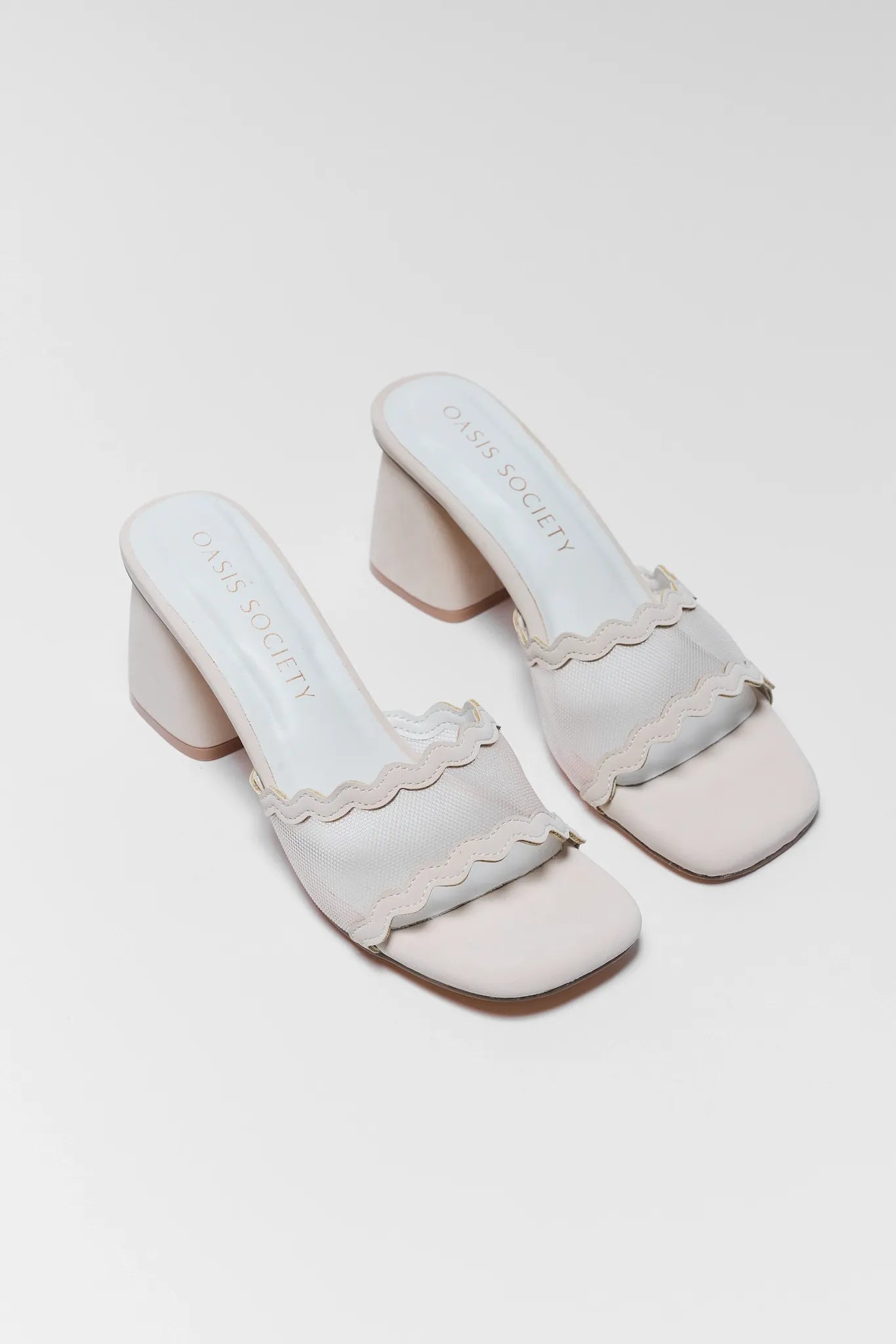 two Trina Bone Mesh Block Heels on white background