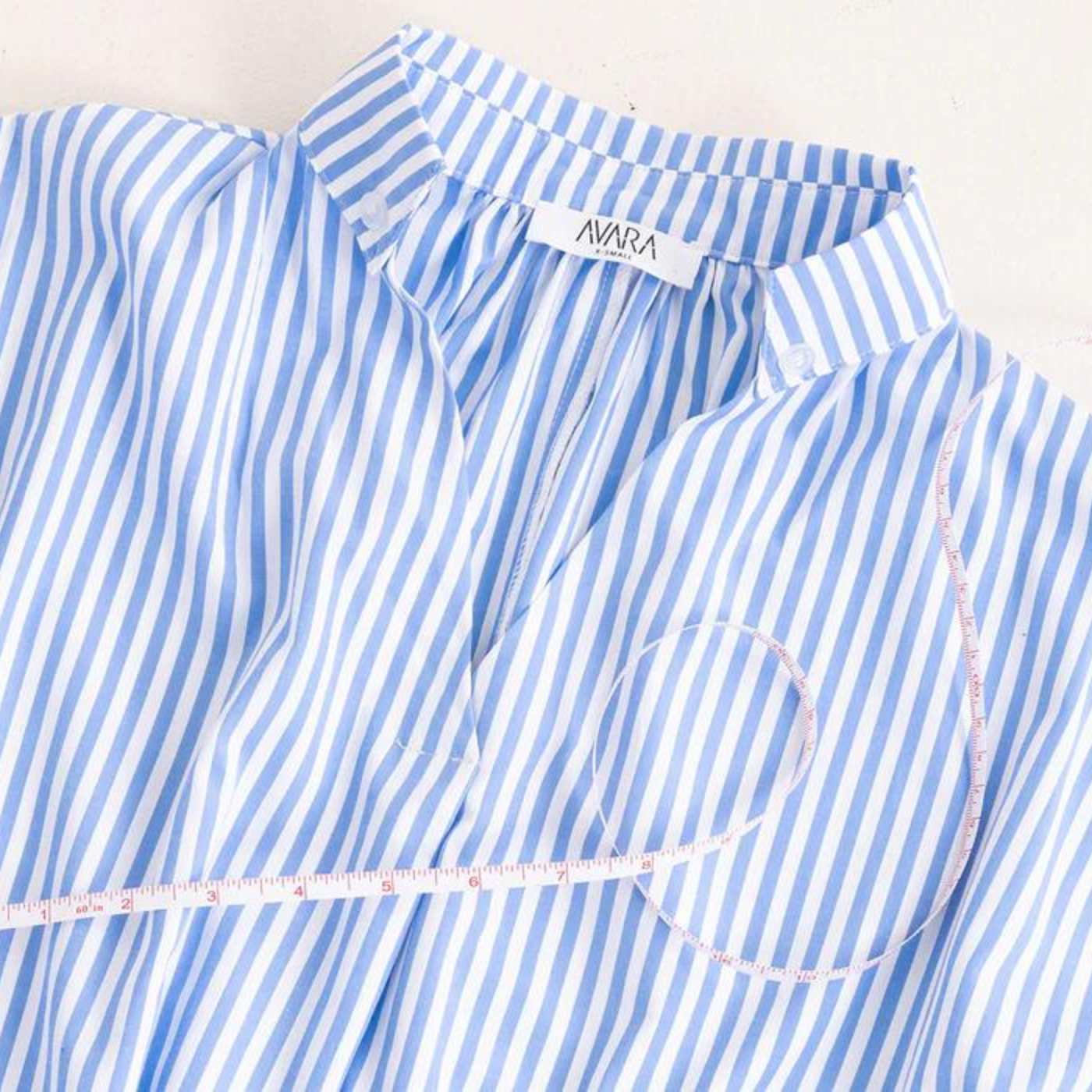 blue and white striped dress with measuring tape