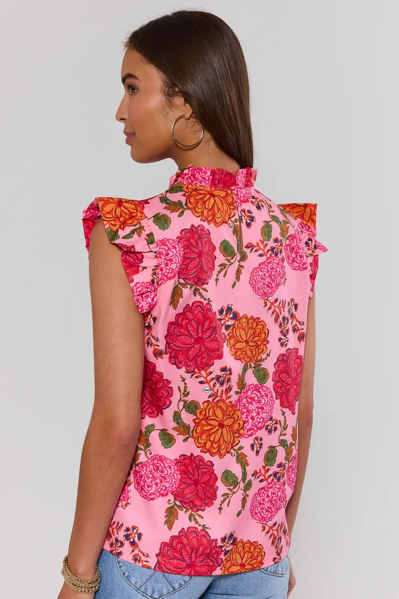 woman standing wearing annabeth floral pink top