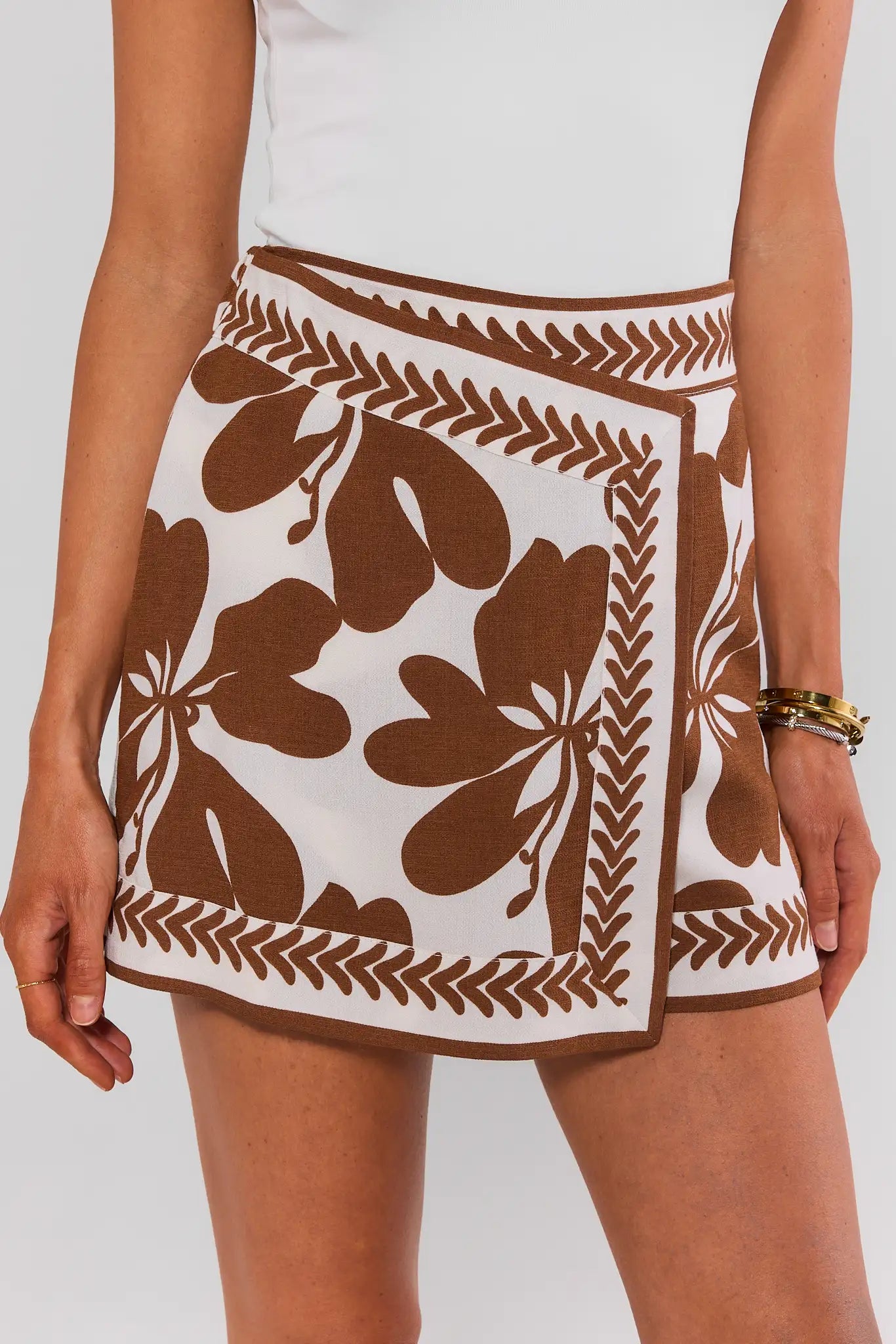 Brown patterned skirt on a plain background