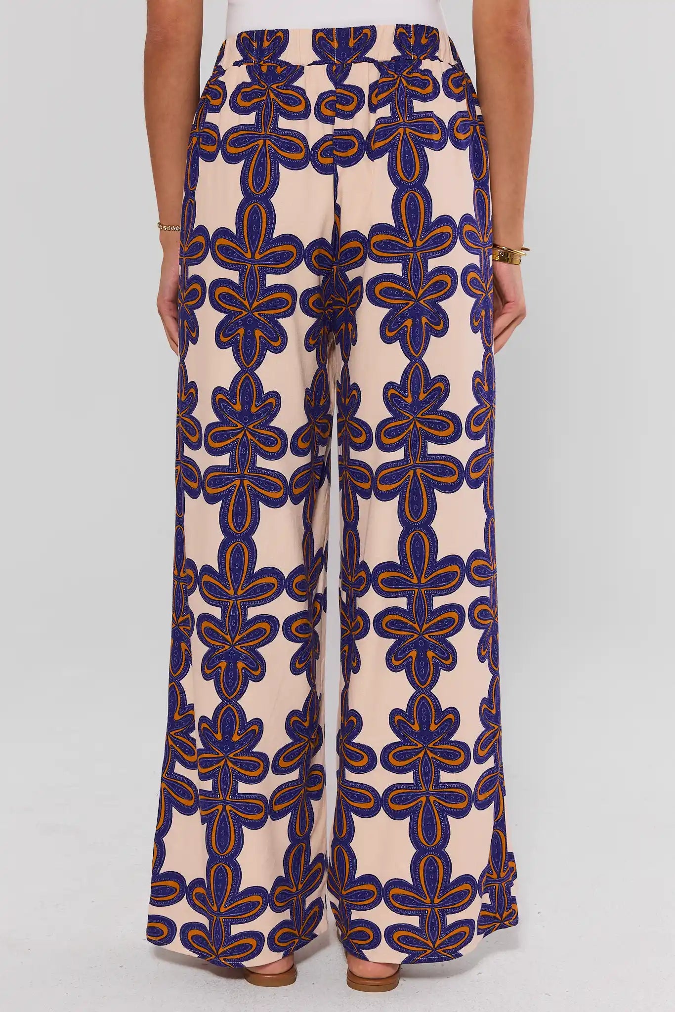 standing Patterned pants worn by a person on a white background