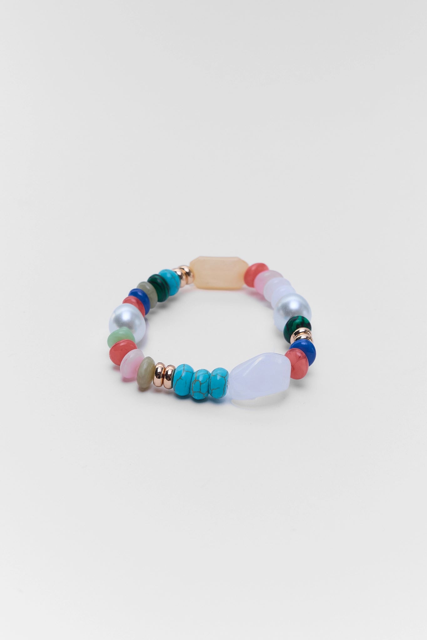 Multicolored beaded bracelet on a white background