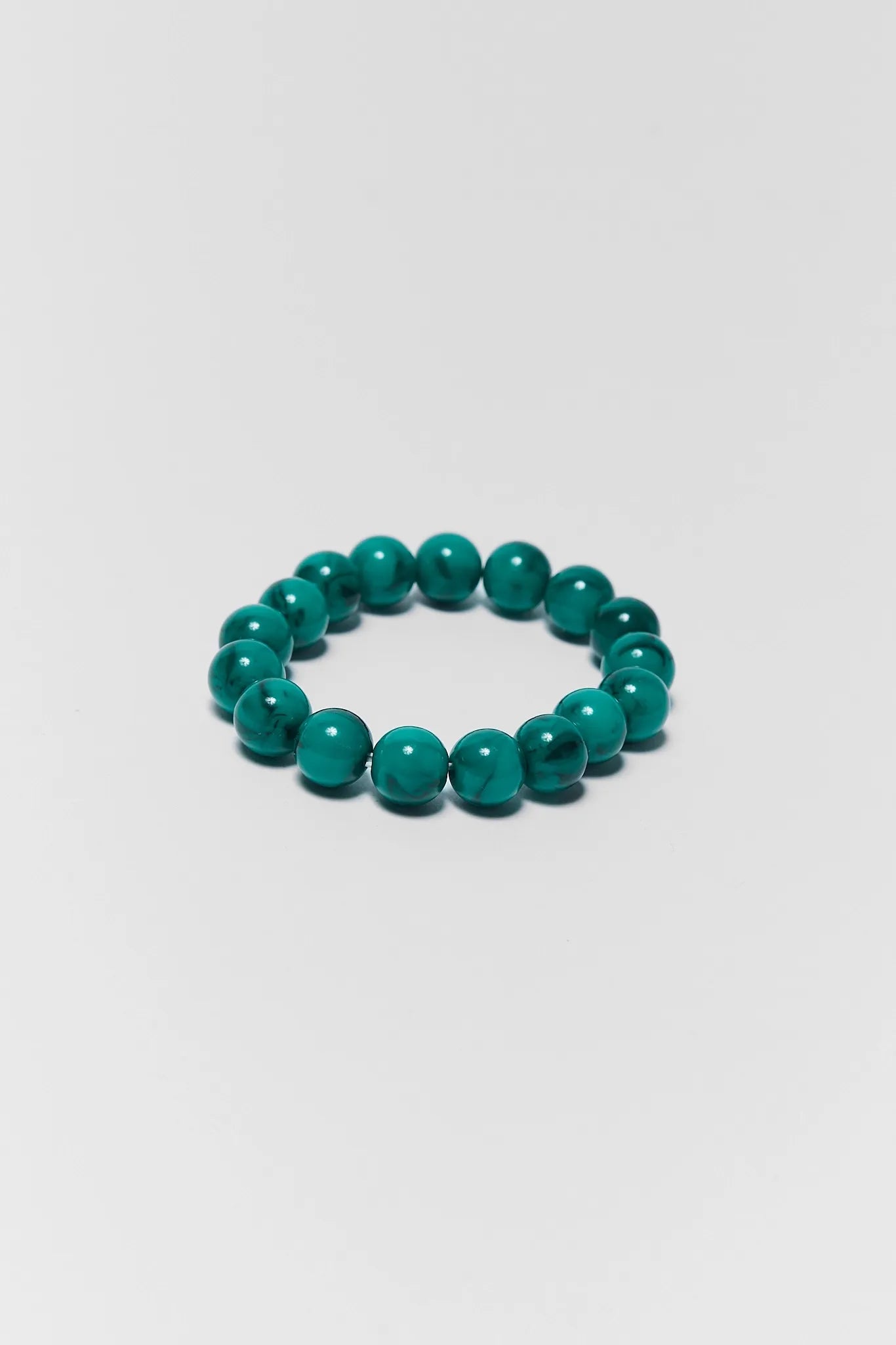 Green Stone Stretch Bracelet on a white background