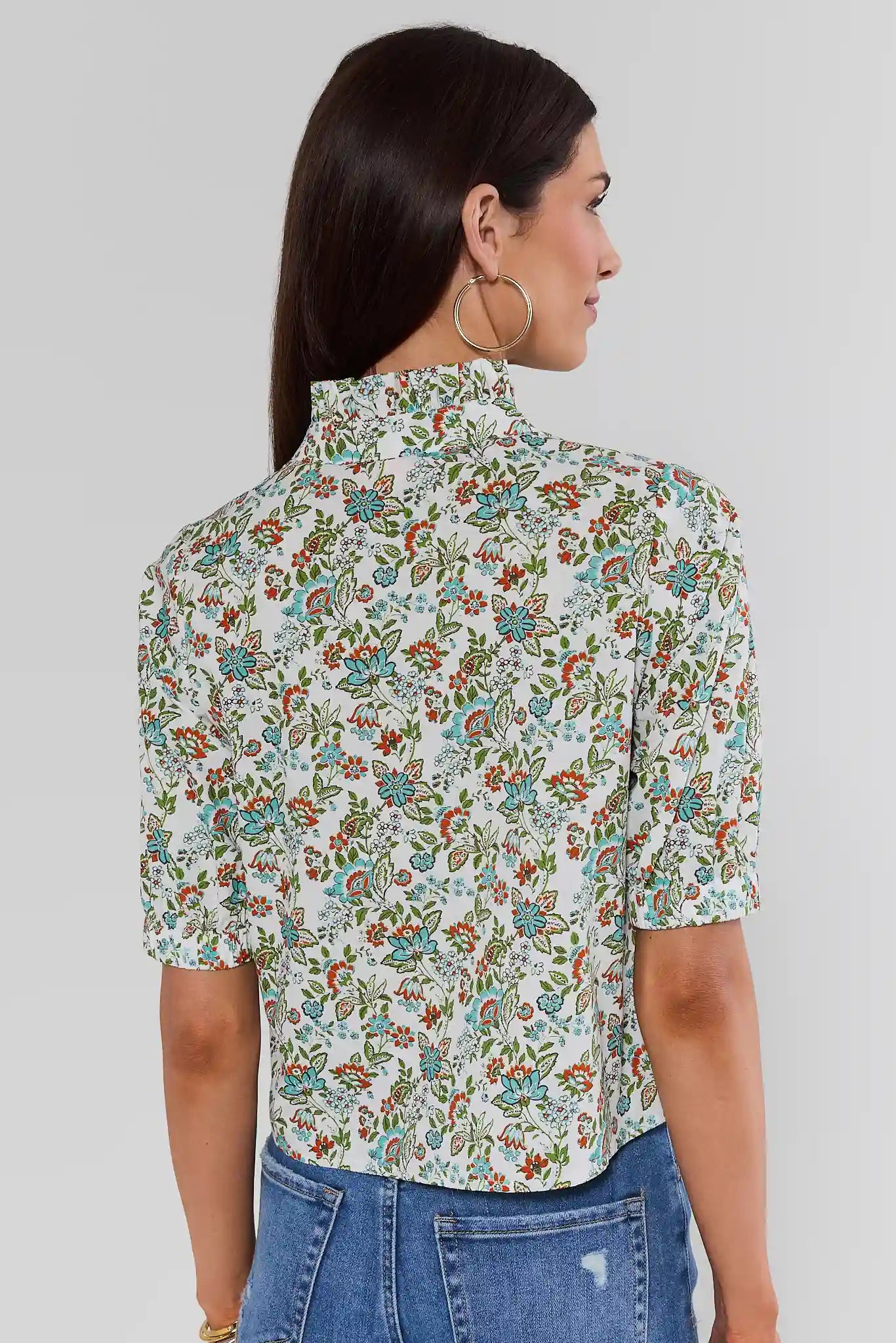 Woman wearing Multi Floral Printed Top by THML on a white background standing