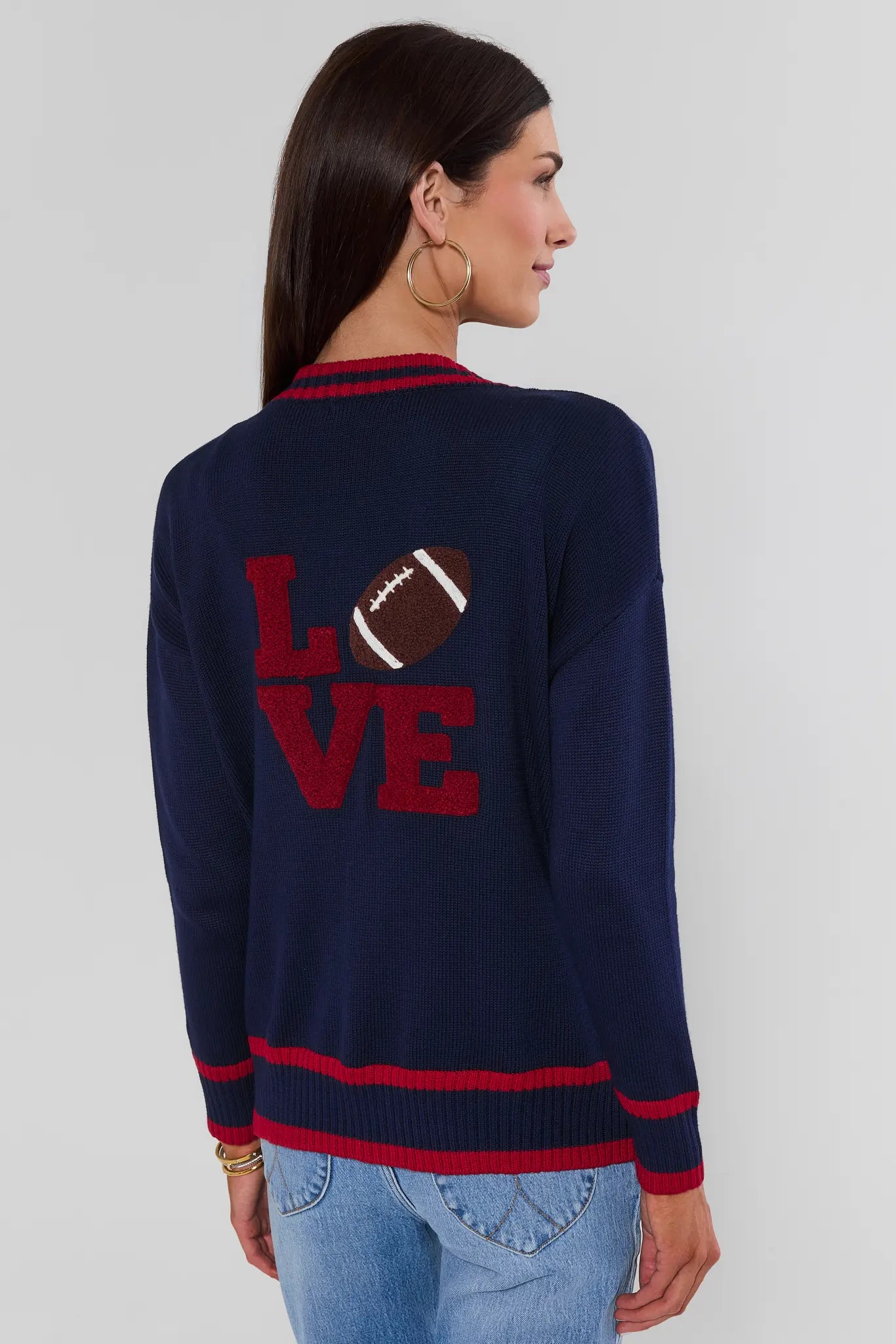 Woman wearing Navy Contrast Trim Applique Cardigan with LOVE with football on back
