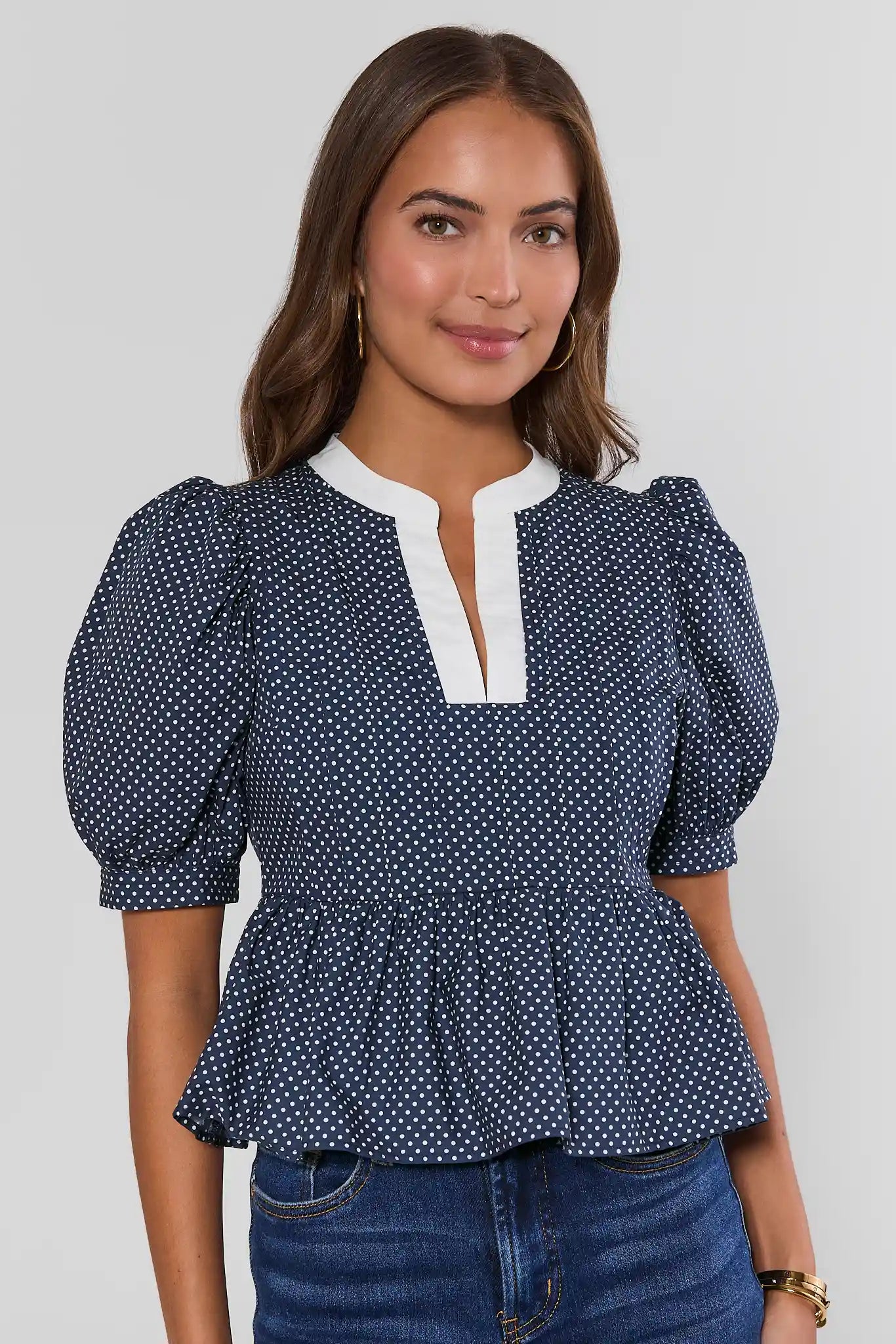 Navy Polka Dot Peplum Top