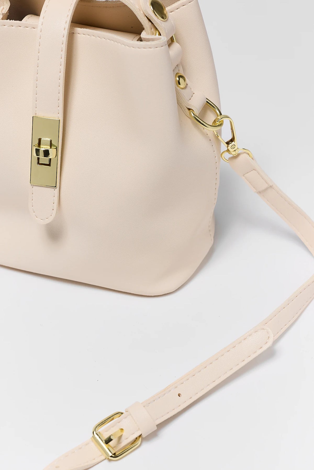 Ivory Turnlock Bucket Bag