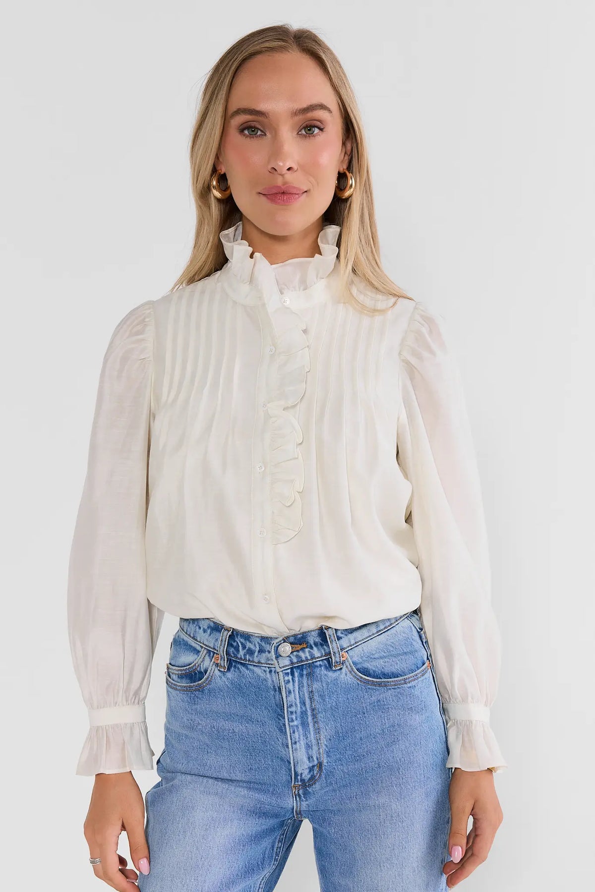 White Pleated Ruffle Button Up Top - Front View On Model with Jeans | Avara