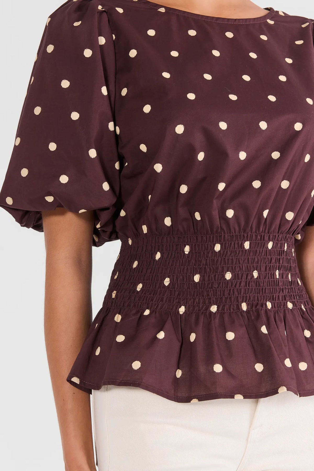 Brown Polka Dot Smocked Top - Smocked Waist Close-Up Detail | Avara