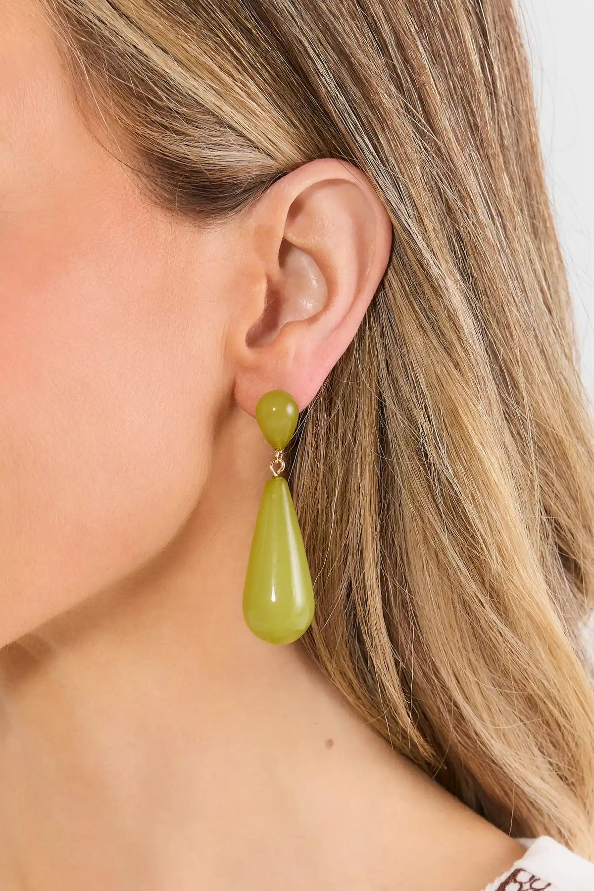 Olive Green Resin Teardrop Earrings - Close-Up On Model Side Profile | Avara
