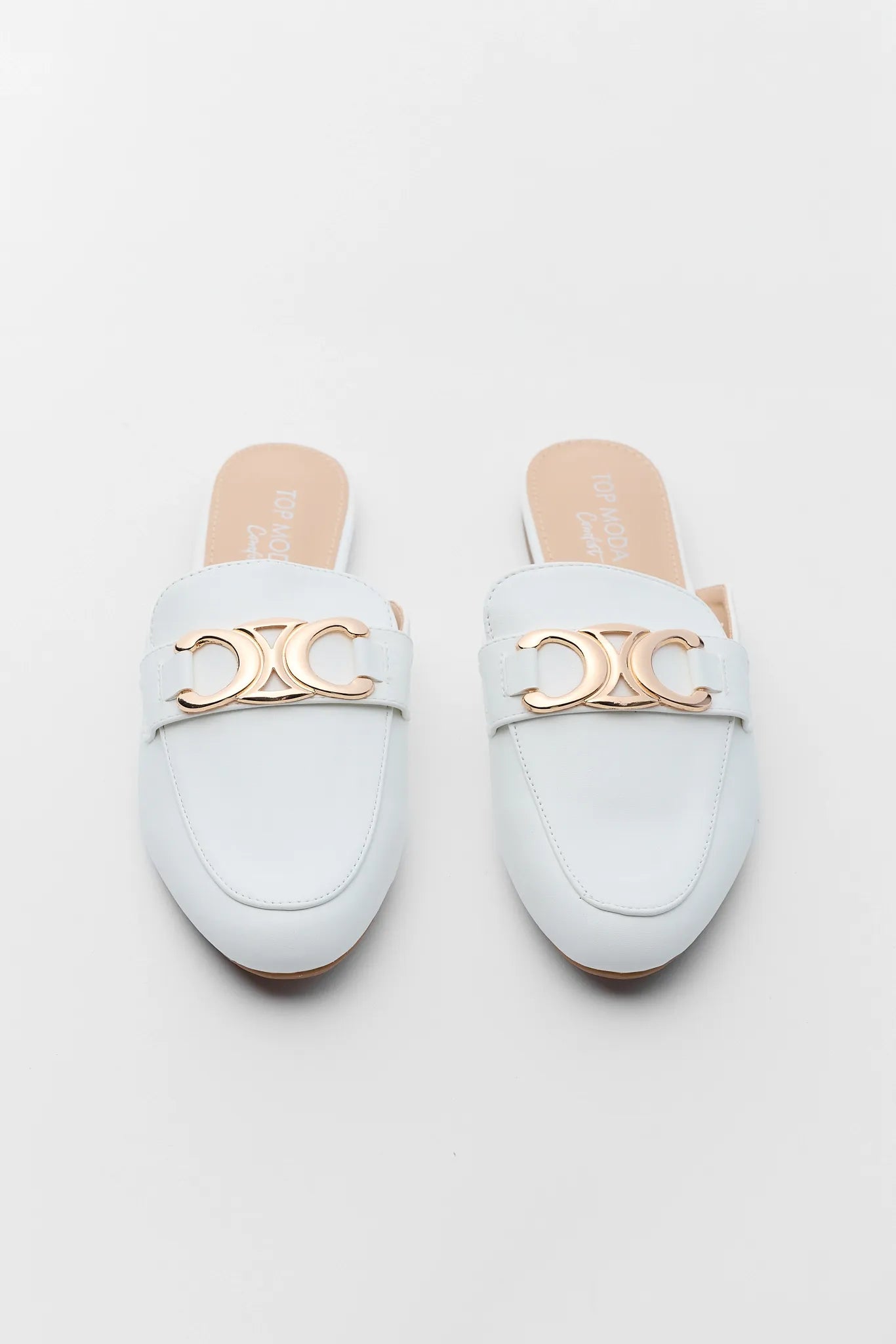 White Bellen Faux Leather Mules on grey background
