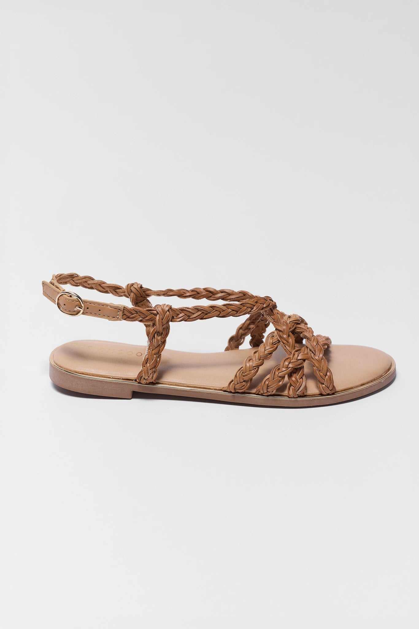 Brown braided sandal on a white background one