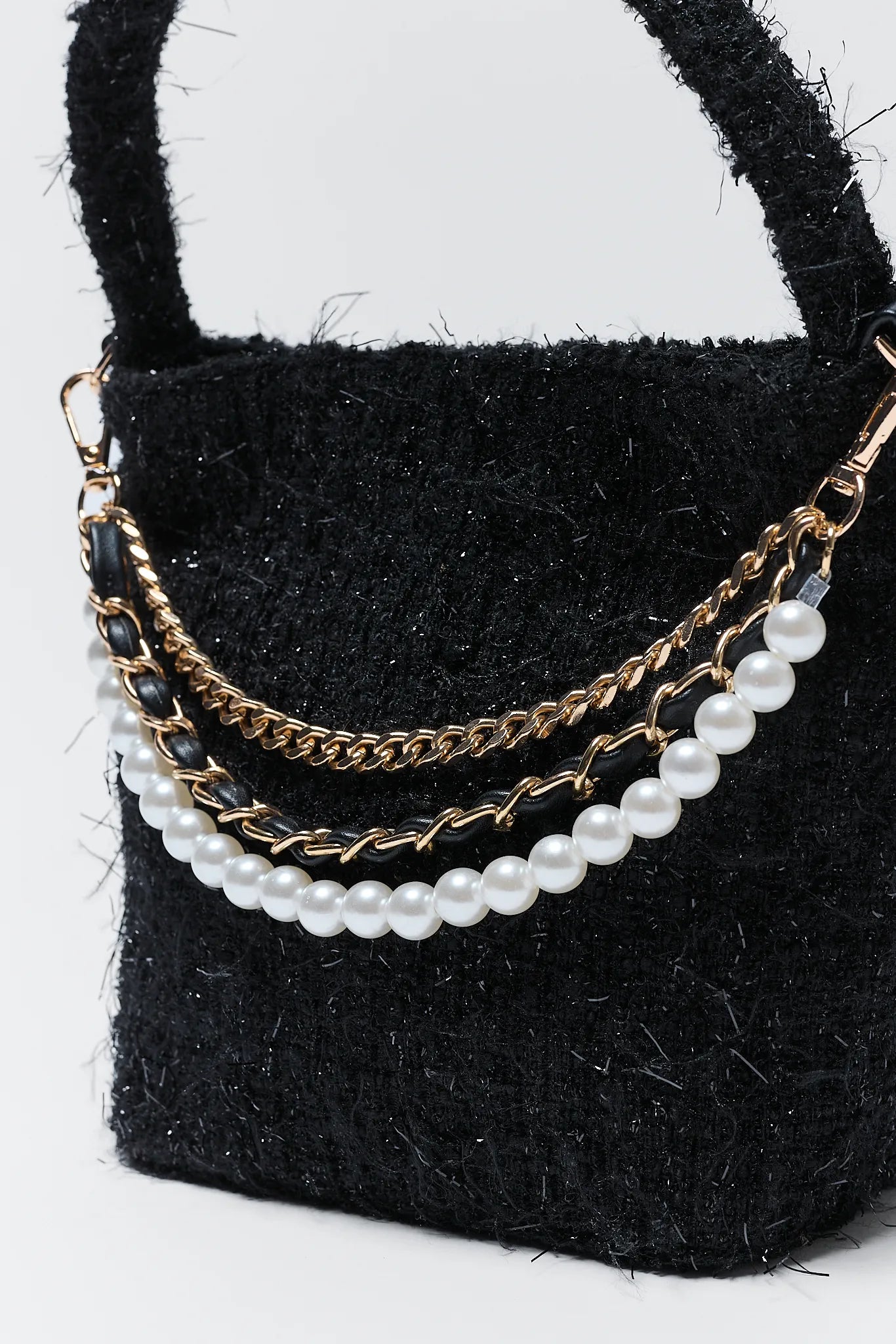 Chloe Black Tweed Bag with pearl and chain details on a white background