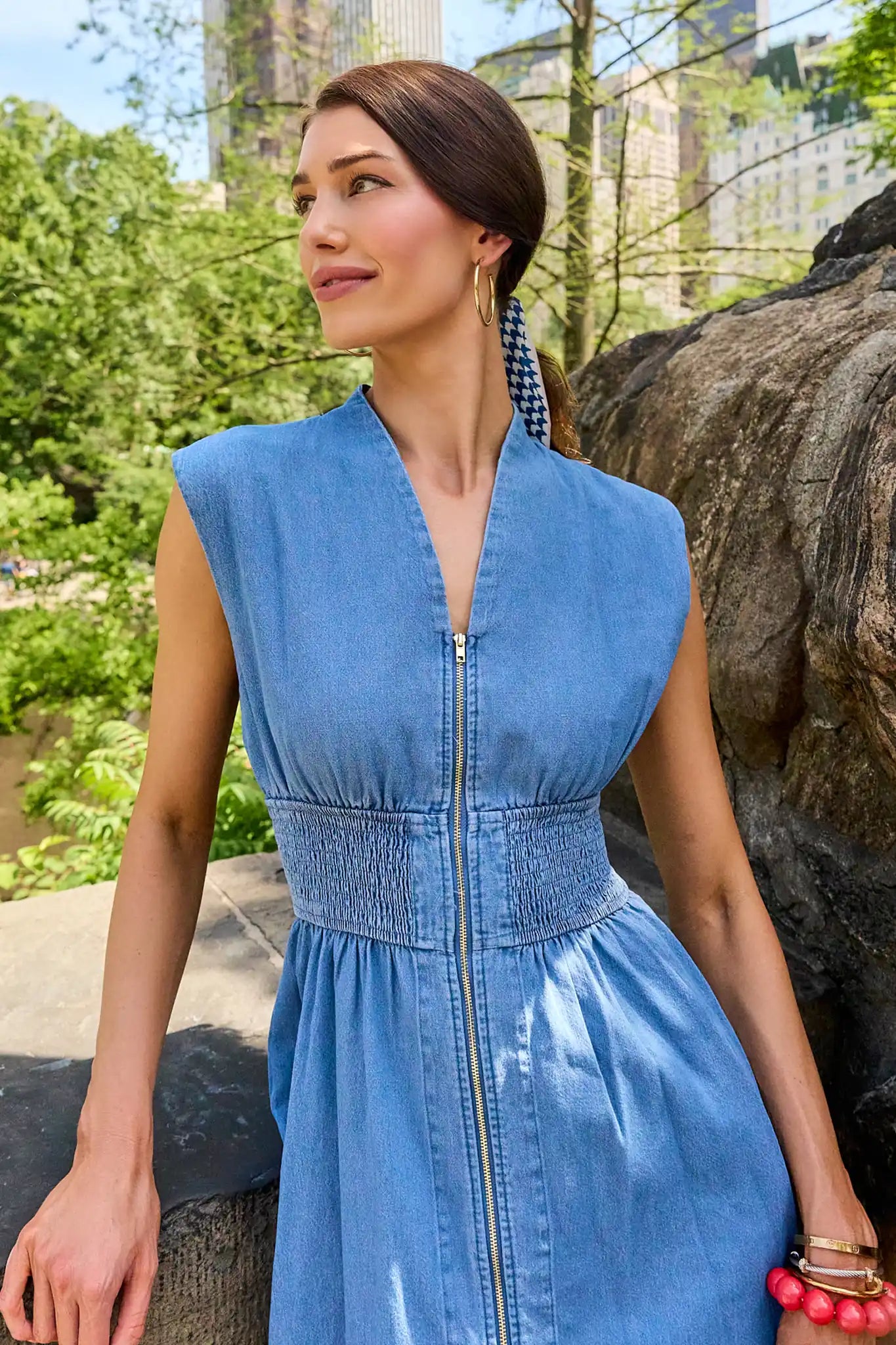close up Woman wearing a blue denim collins dress 