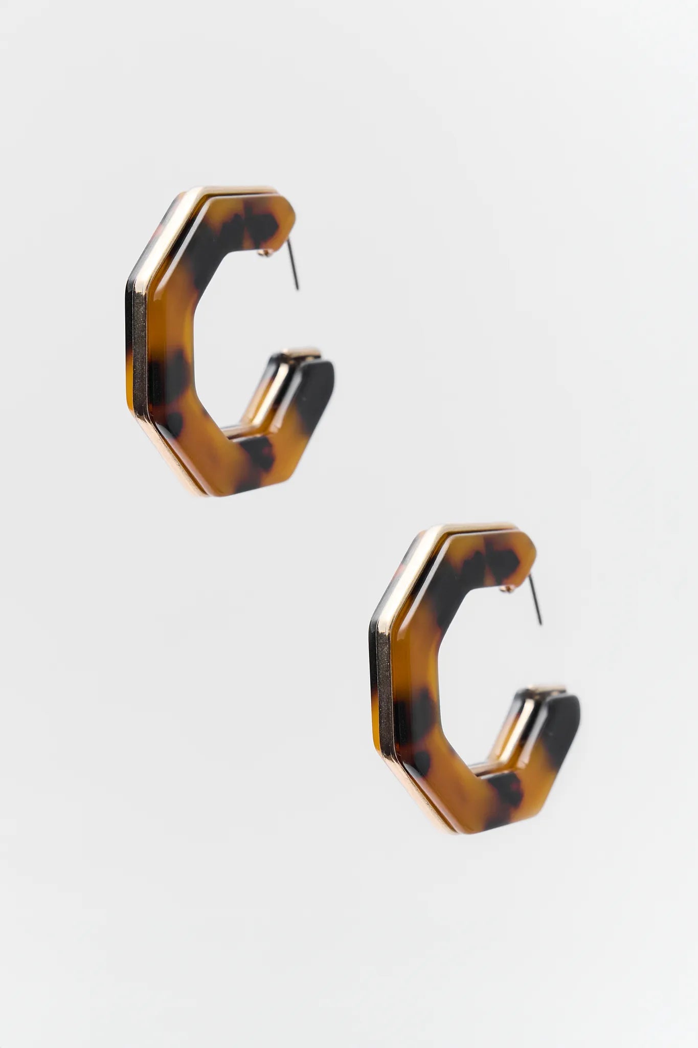 Elena earrings on a light gray background