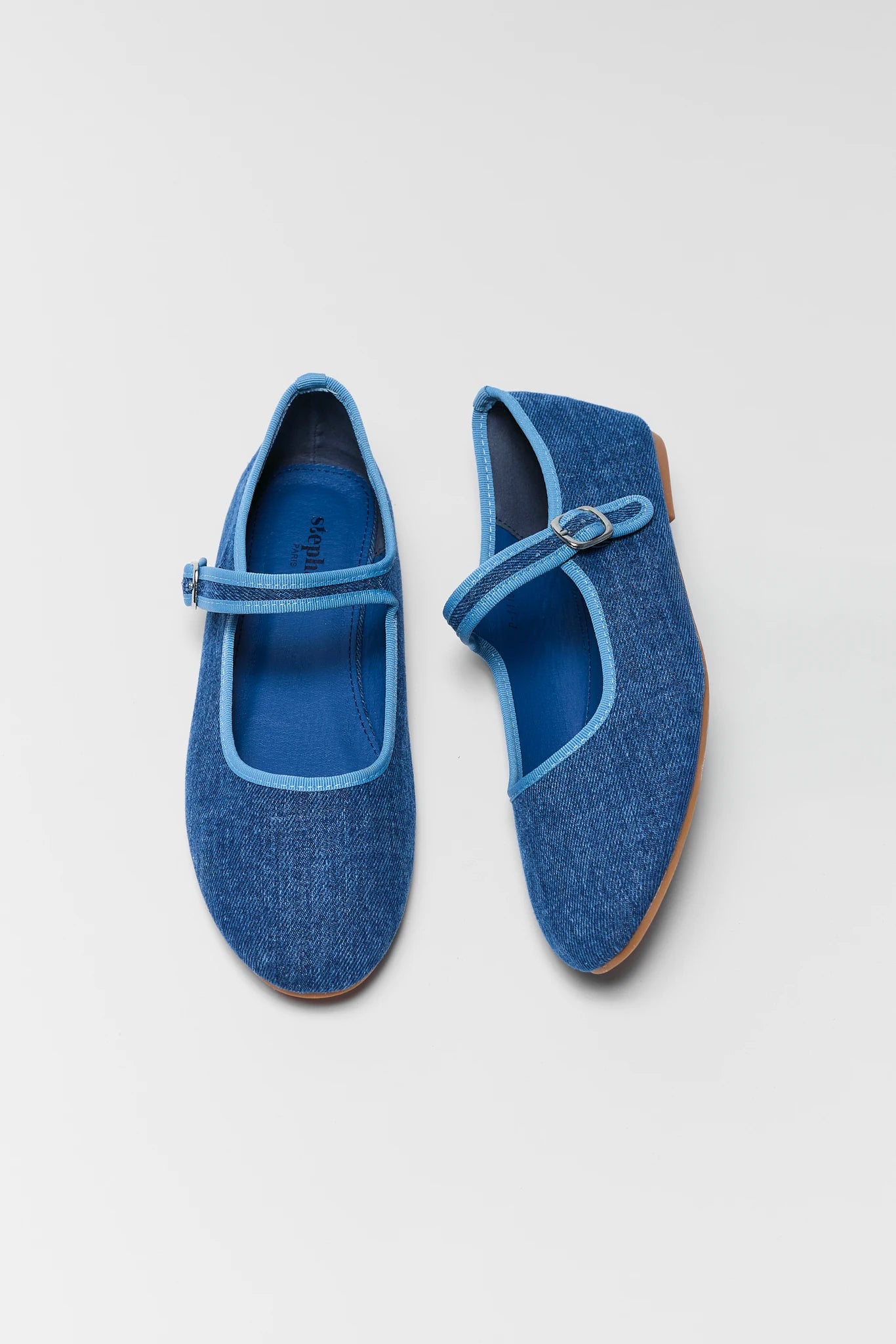 ellie blue denim flats on white background