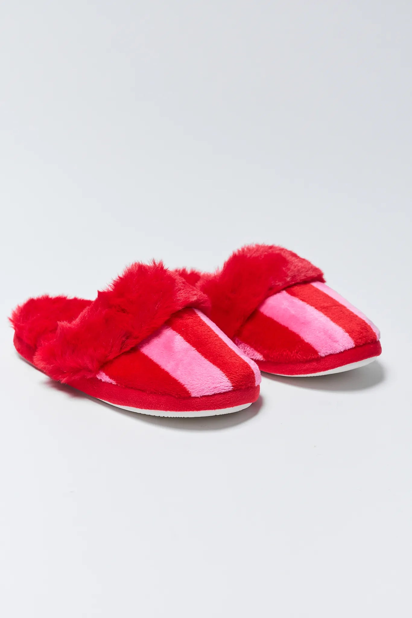 Felicity Striped Fuzzy Slippers with fur trim on a light gray background