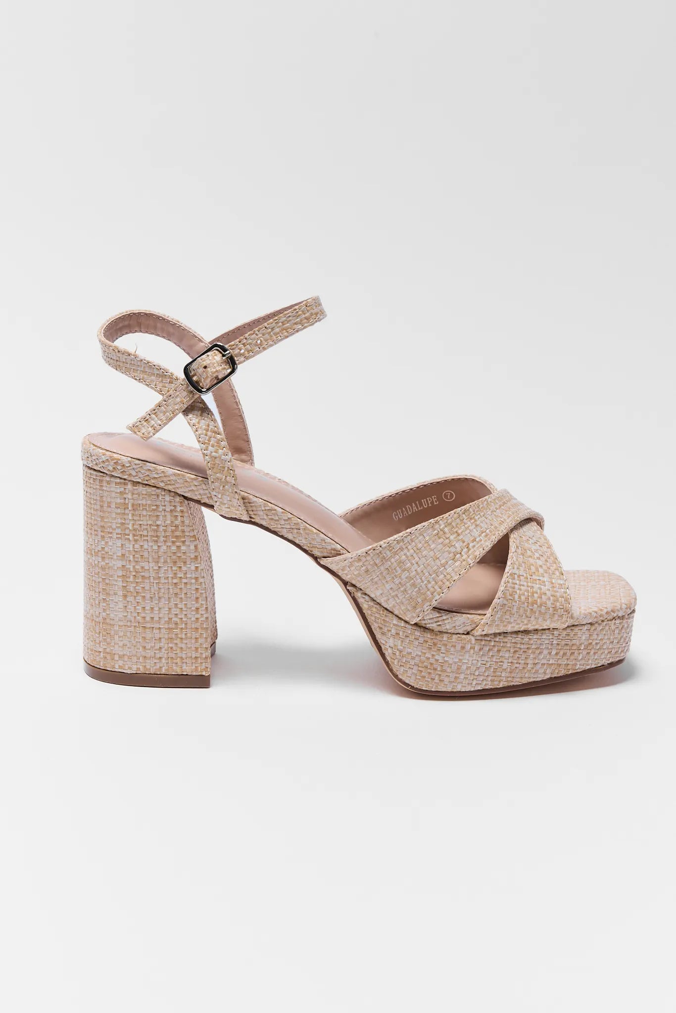 Beige high-heeled sandal on a white background