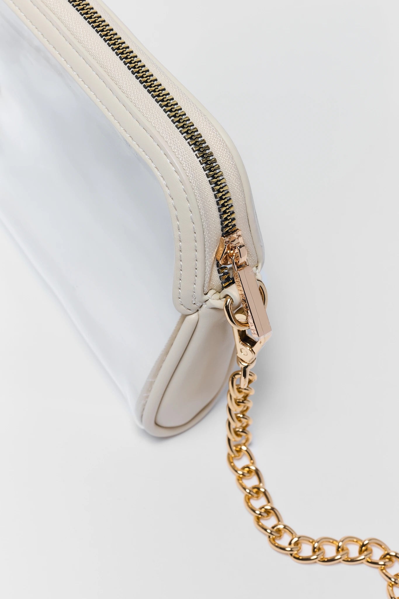 close up of Ivory Trim Clear Crossbody Bag on white background