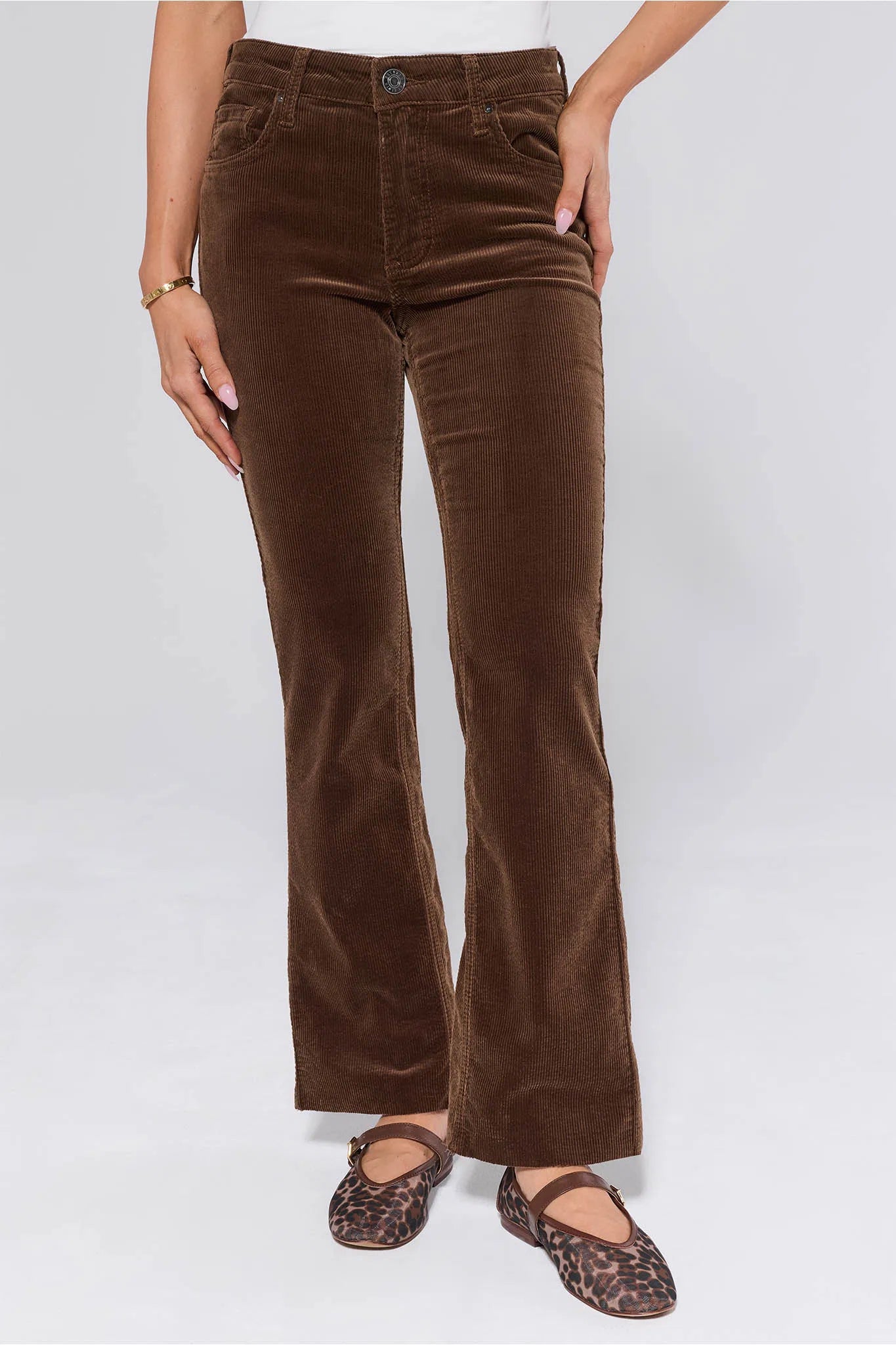 Brown Kelsey Pants Corduroy worn by a person on a white background