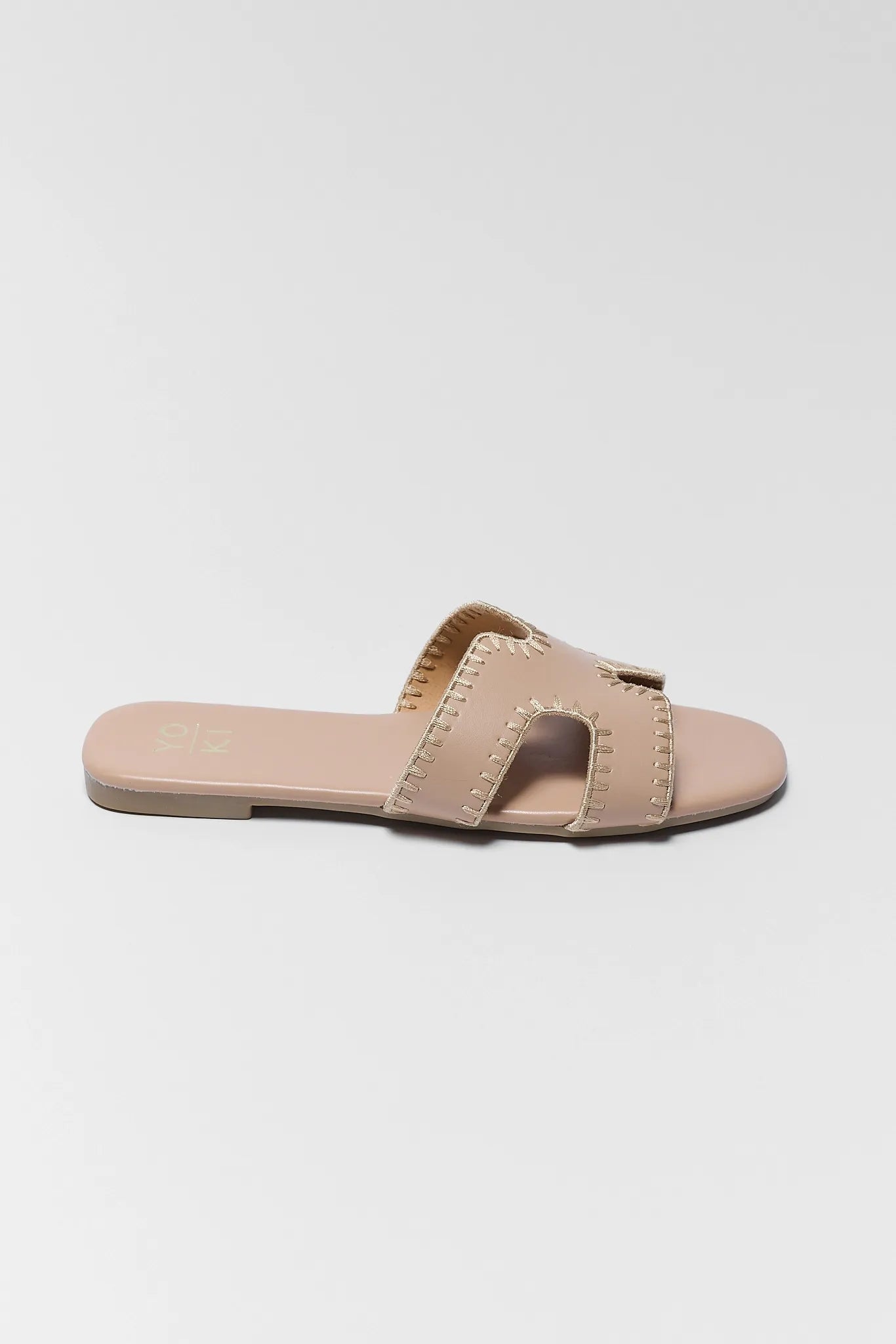 one Leslie Tan Faux Leather Sandals on white background