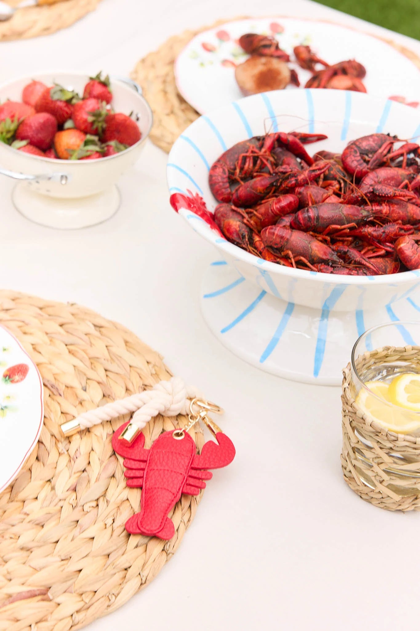 Bowl of crawfish with strawberries on a table