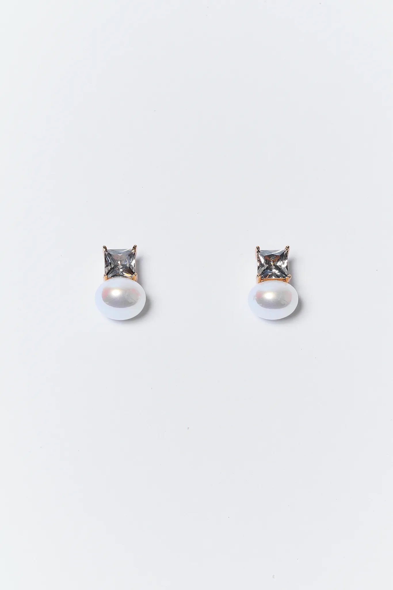 Lucy Pearl and Crystal Earrings on a white background