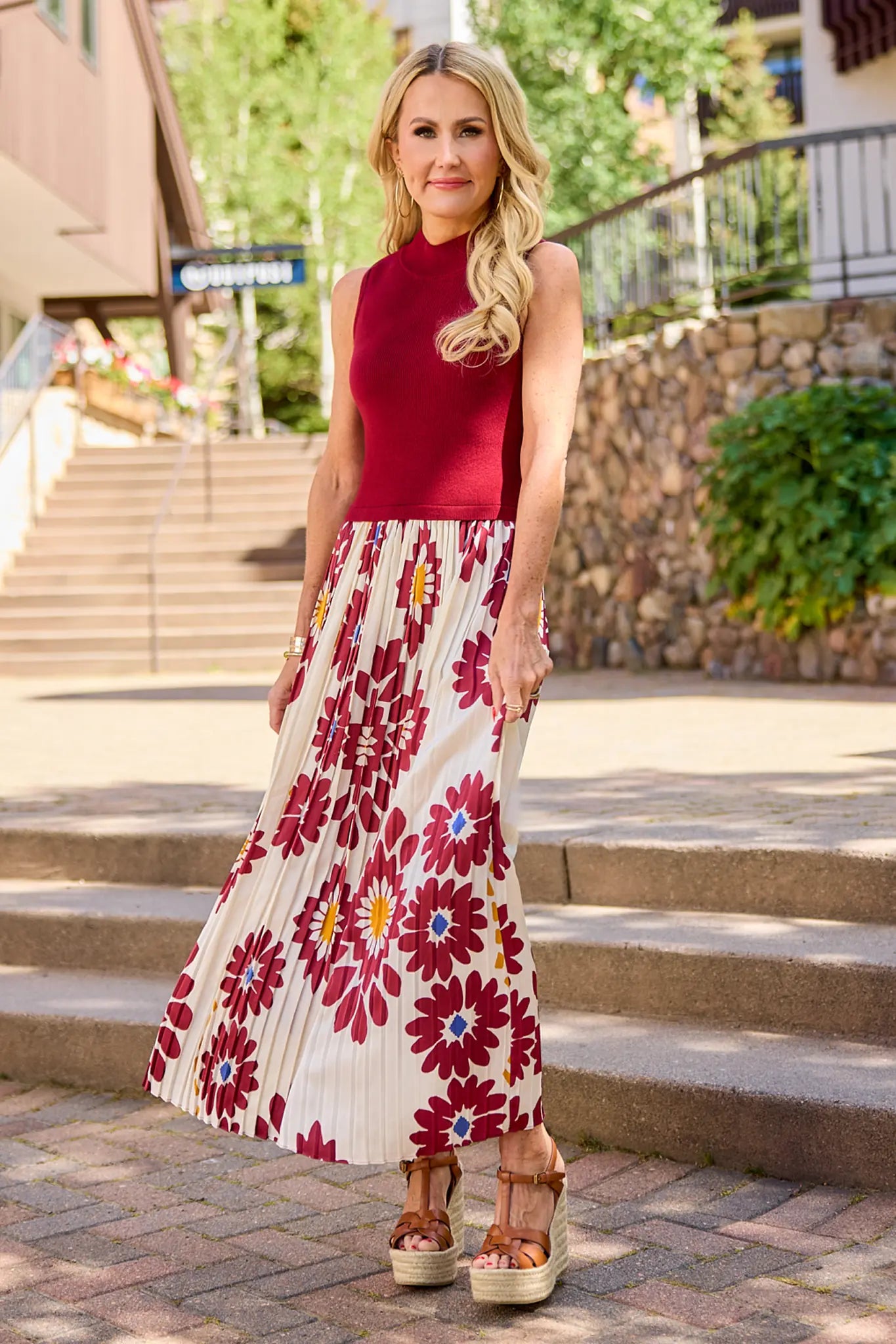 woman wearing marcia burgundy dress outdoors walking