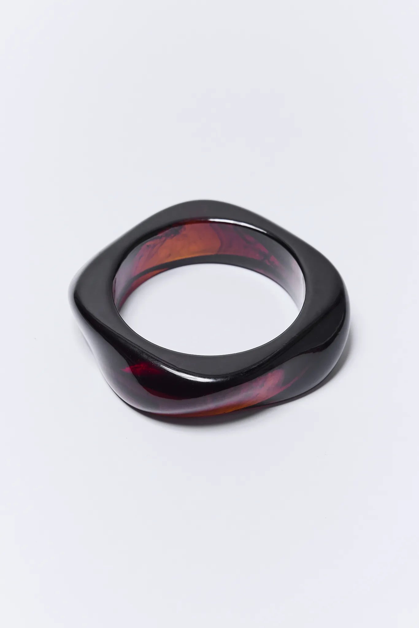 Black and red Maria Bracelet on a white background