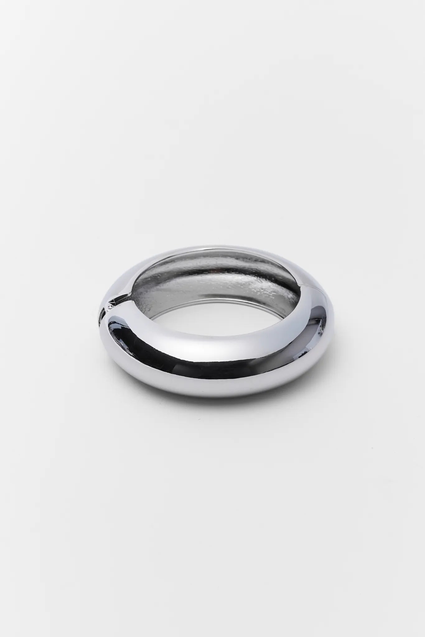 Silver ring on a white background