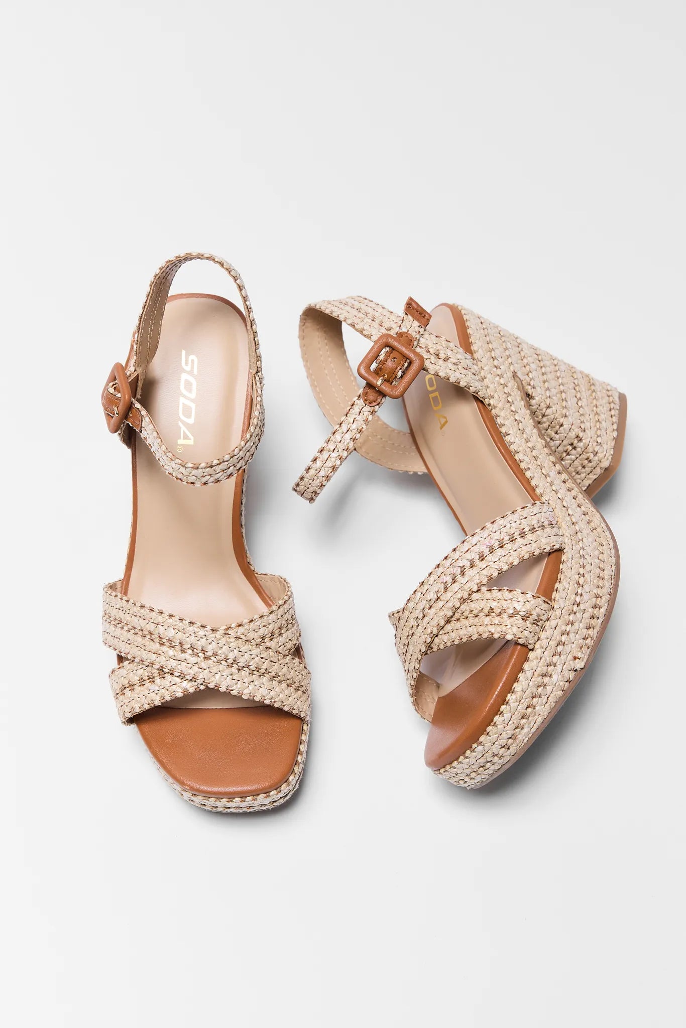 Pair of Millie Raffia Platform Heels on a light gray background