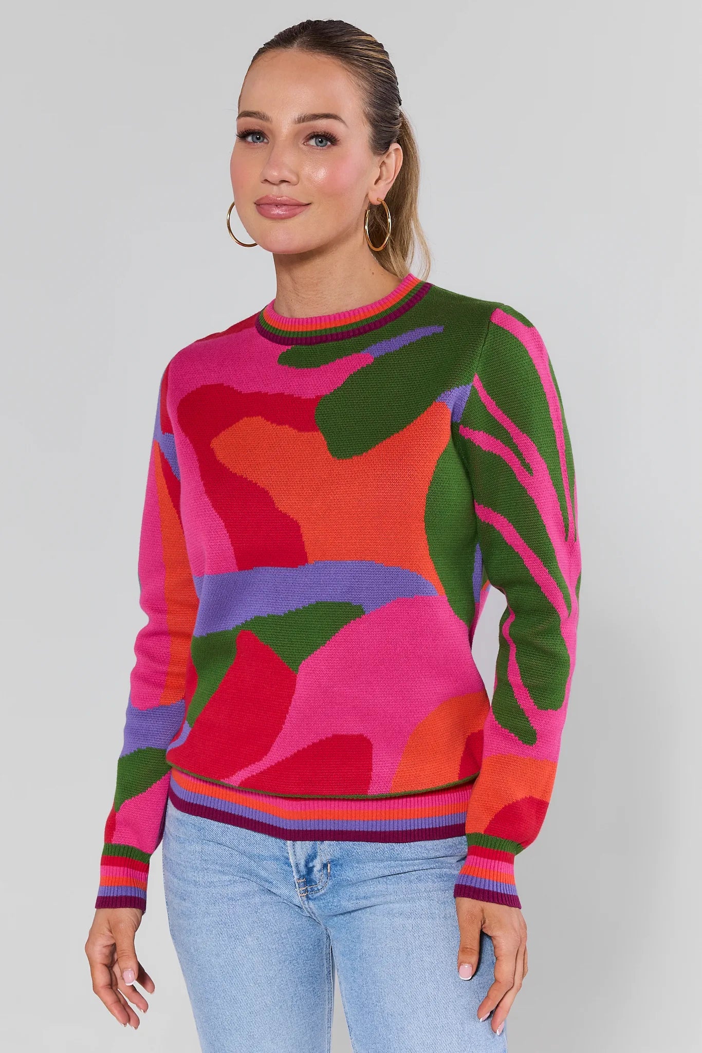 Woman wearing a Marcia Multicolor Knit Sweater against a plain background