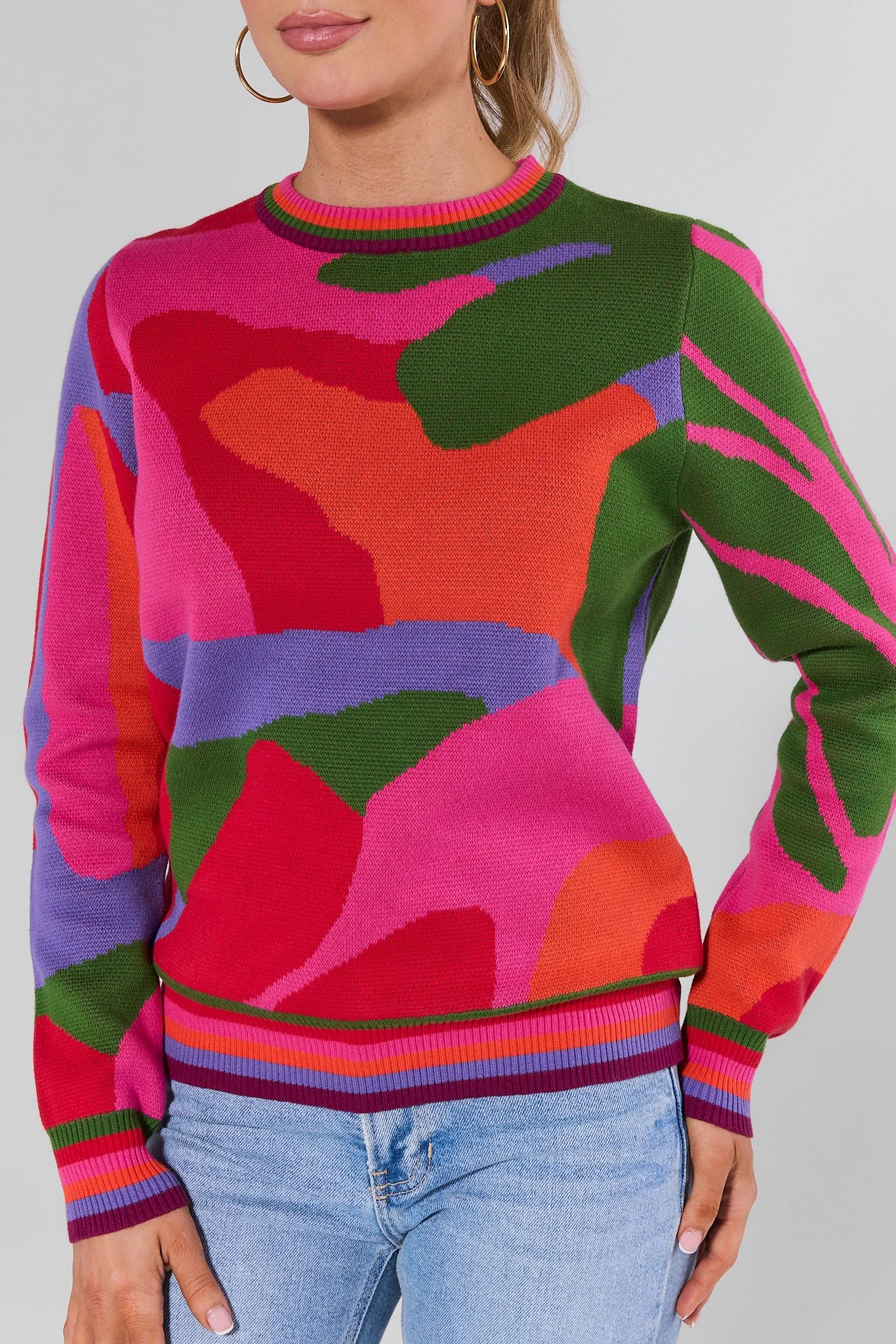 Woman wearing a Marcia Multicolor Knit Sweater against a plain background