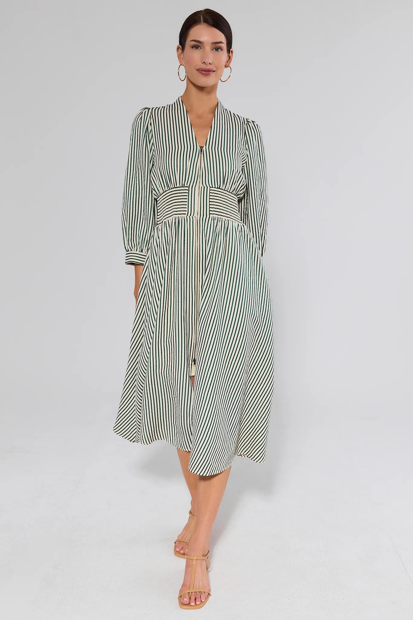 full body woman wearing green brantley dress on white background