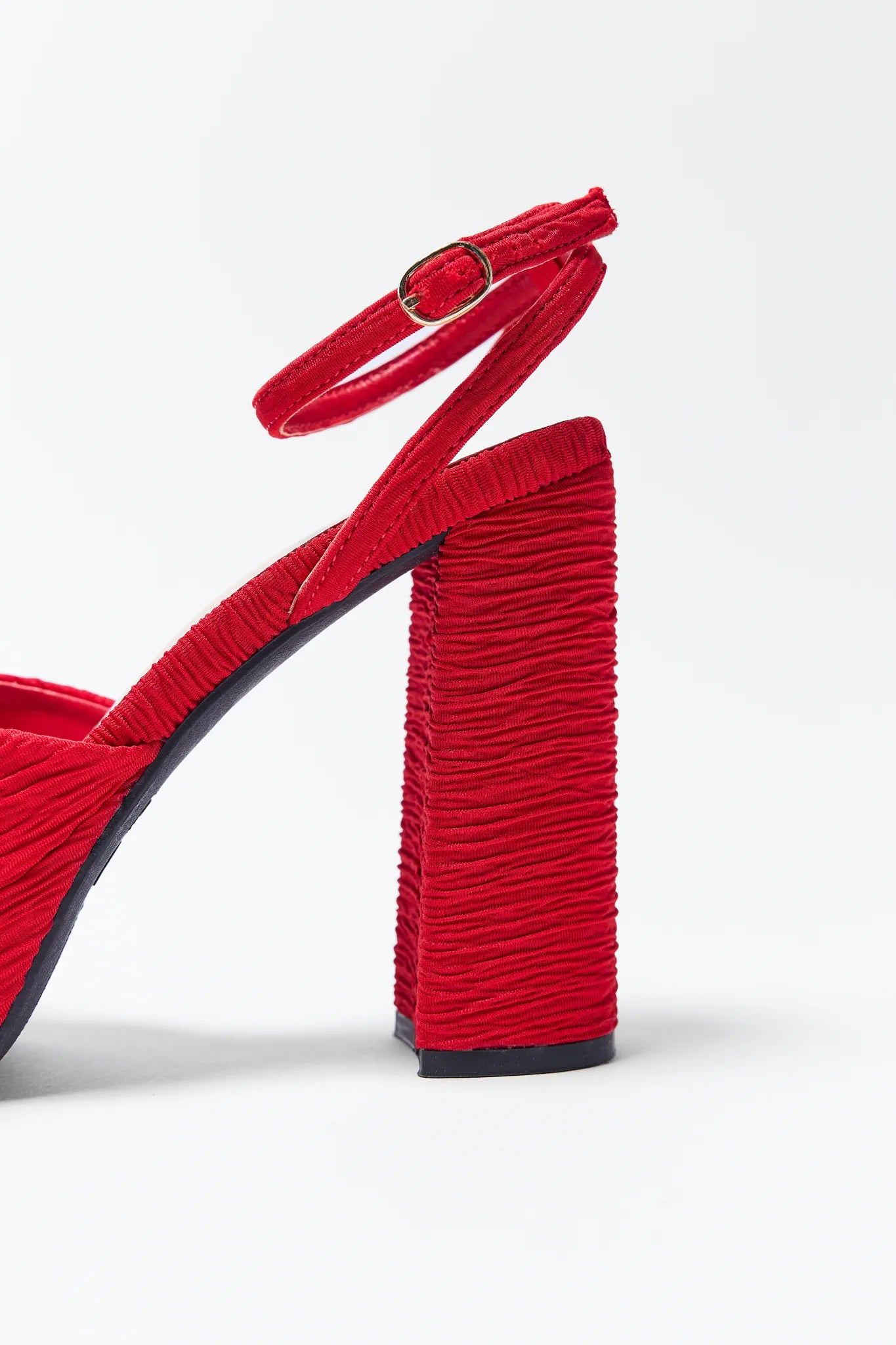 Nicole Red Platform Heels with bow details on a white background