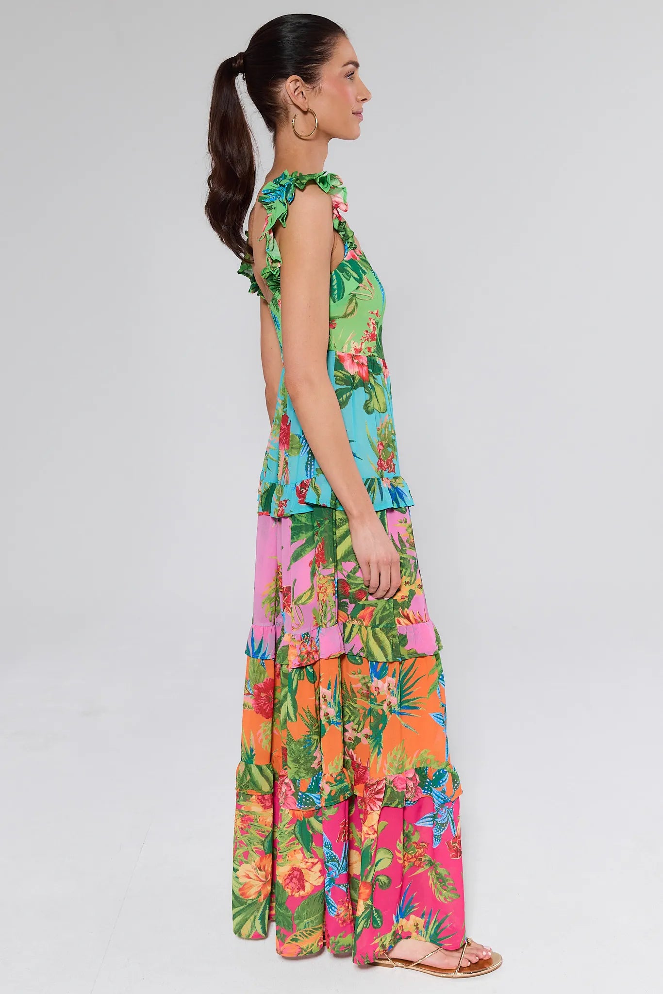 Woman wearing a floral dress on a white background