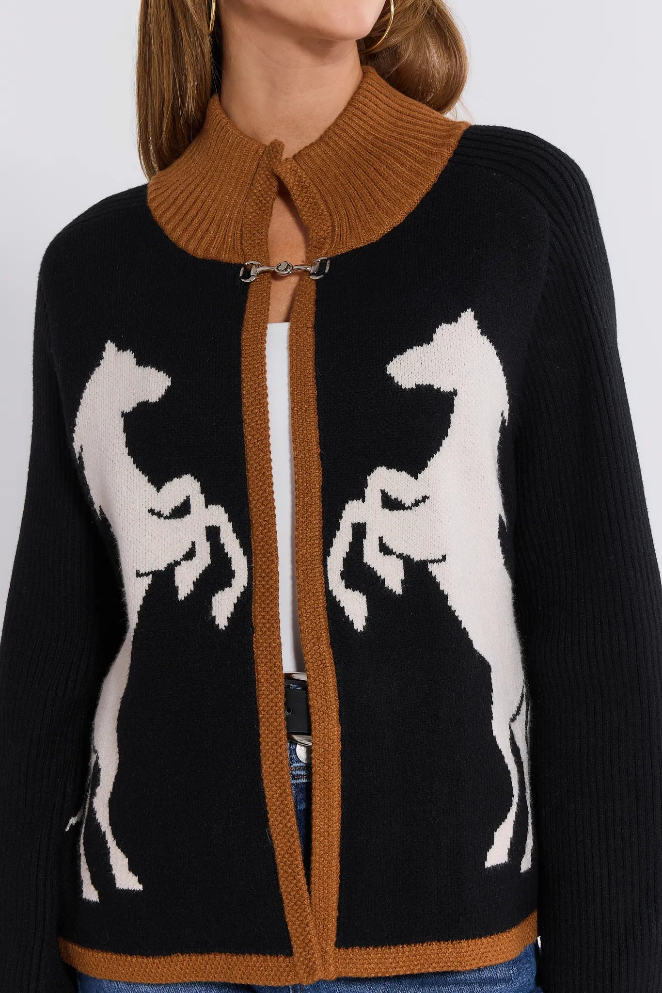 Black Cheyenne Cardigan with horse designs and brown collar on a white background