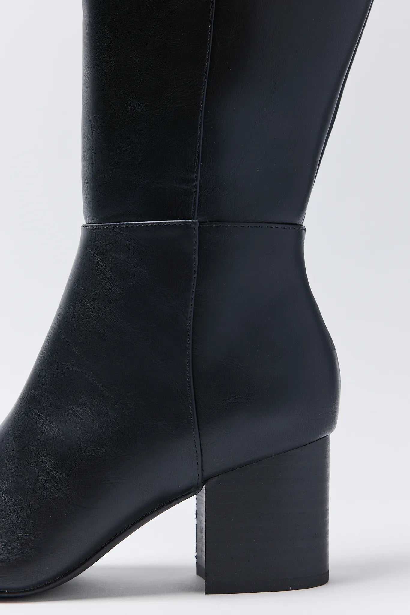 Black Fiona Boots with a block heel on a white background