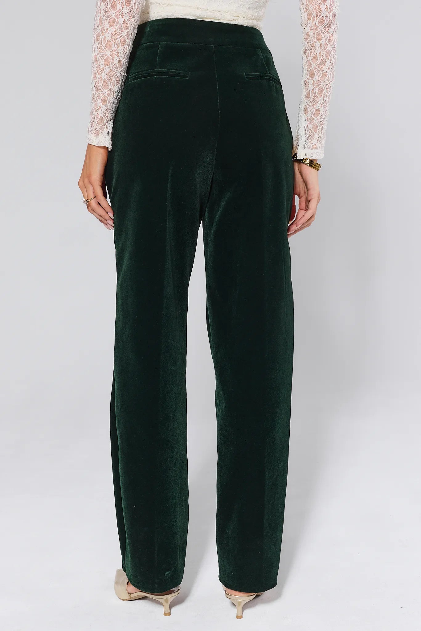  Green Evie Green Velvet Pants worn by a person on a white background