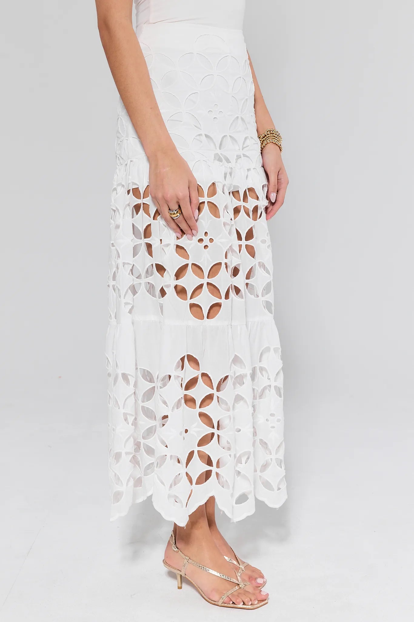 Cynthia White Cutout Maxi Skirt on a plain grey background