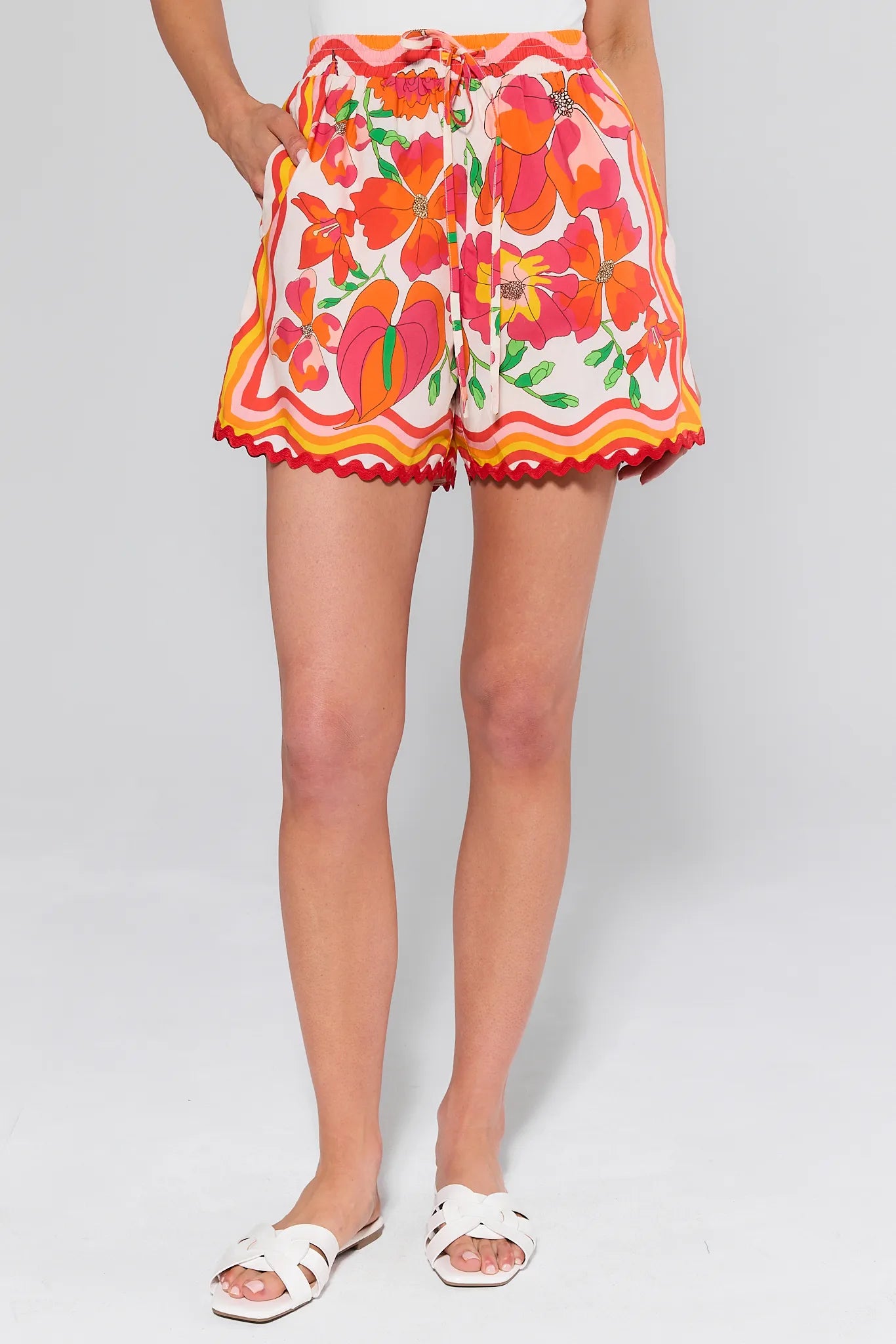 Melissa Orange Printed Drawstring Shorts with a white background