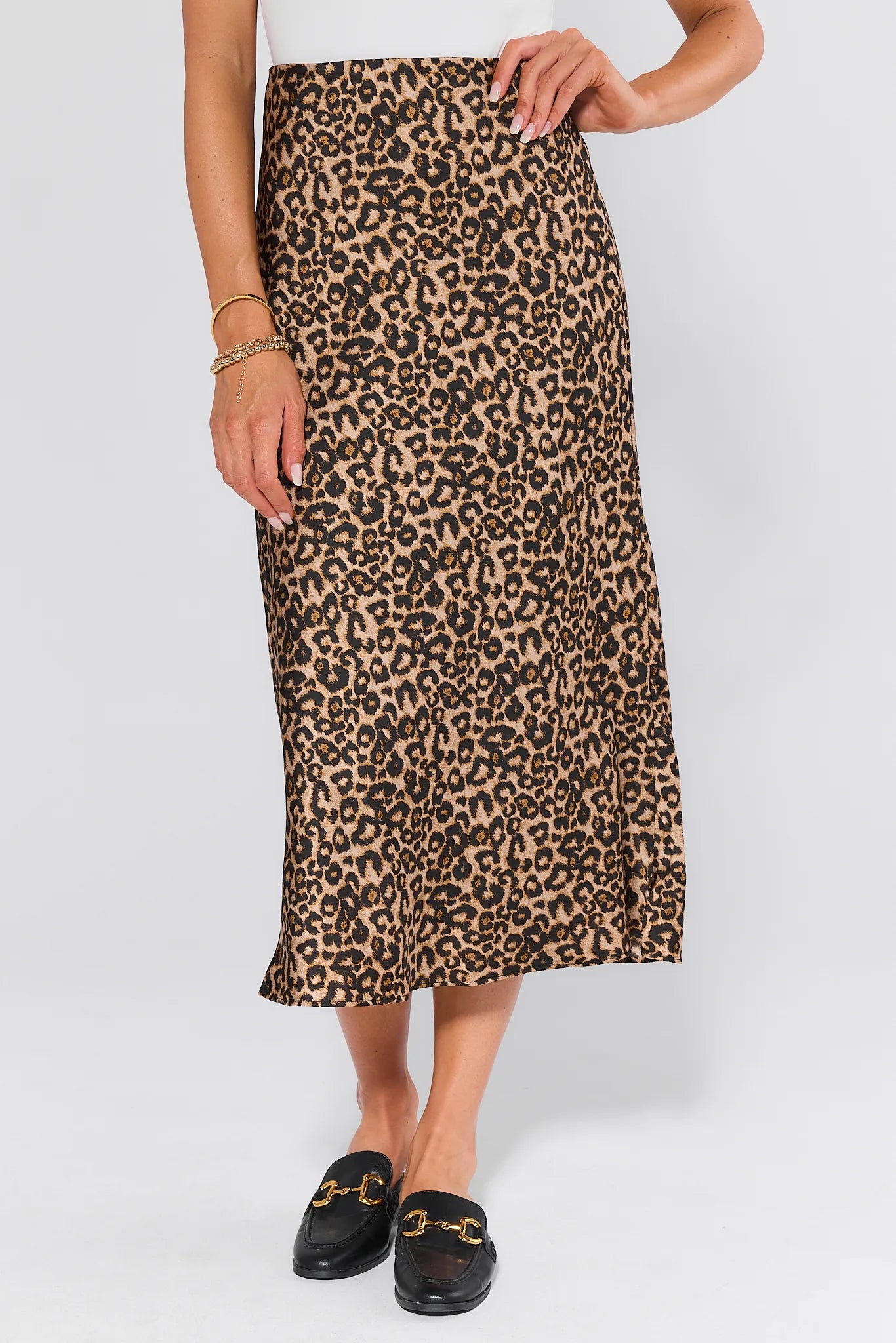 Person wearing a leopard print Gretchen Skirt on a white background