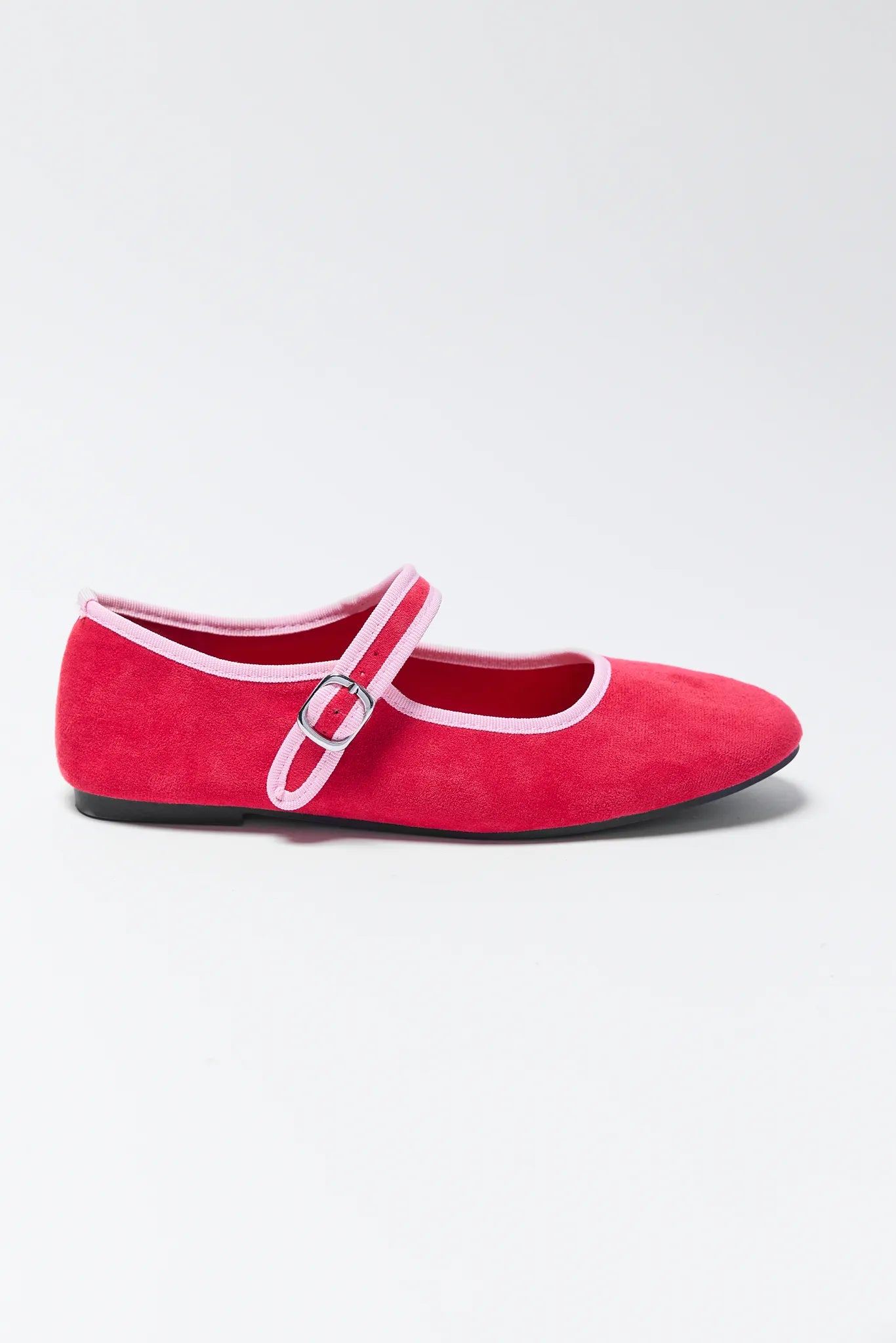 Ellie Red Velvet Flats with pink straps on a light gray background