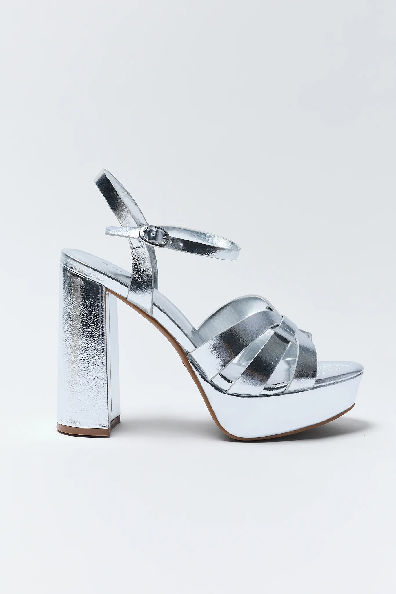 Rachel Silver Platform Heels on a white background