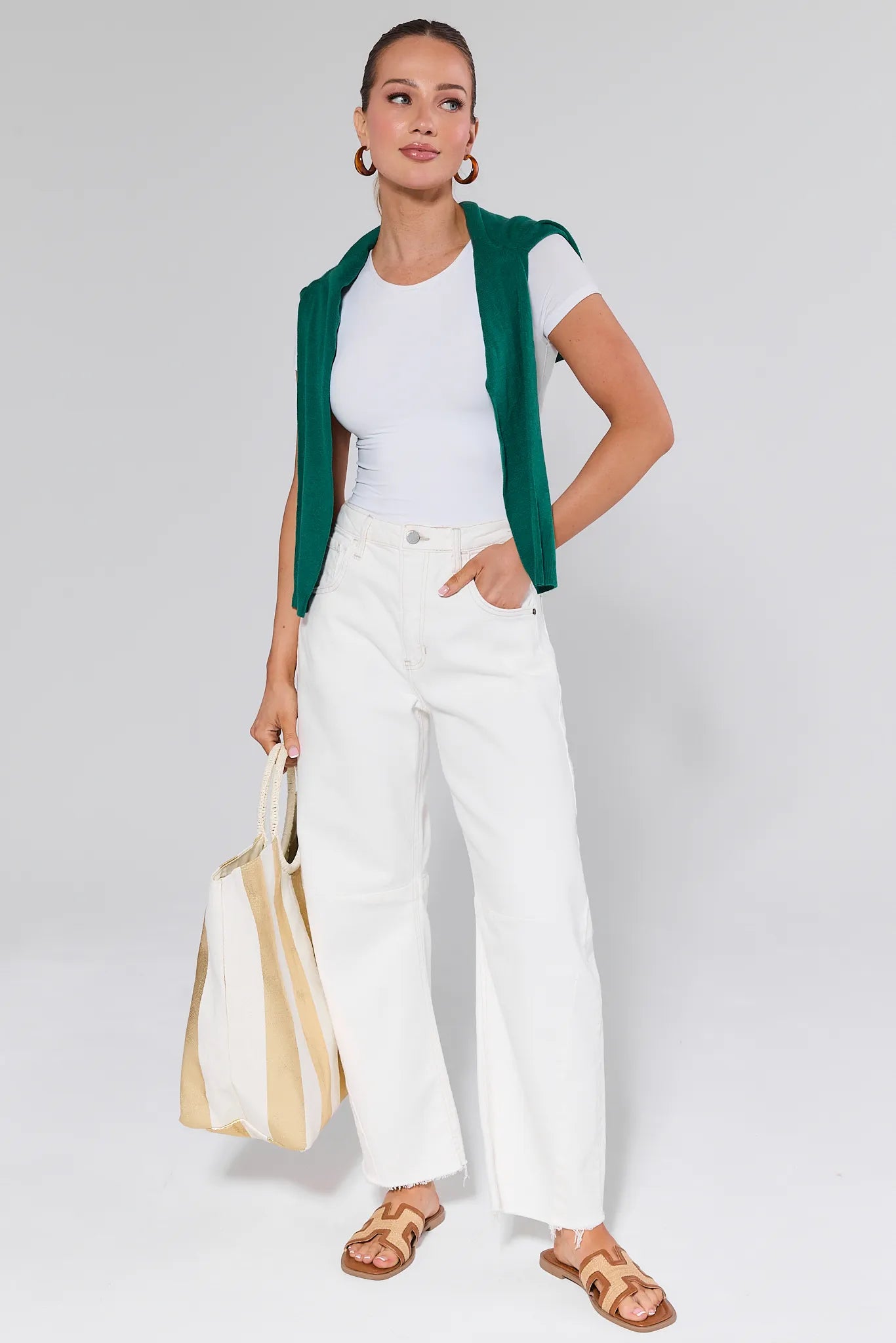 Blaine White Barrel Jeans worn by a person on a white background