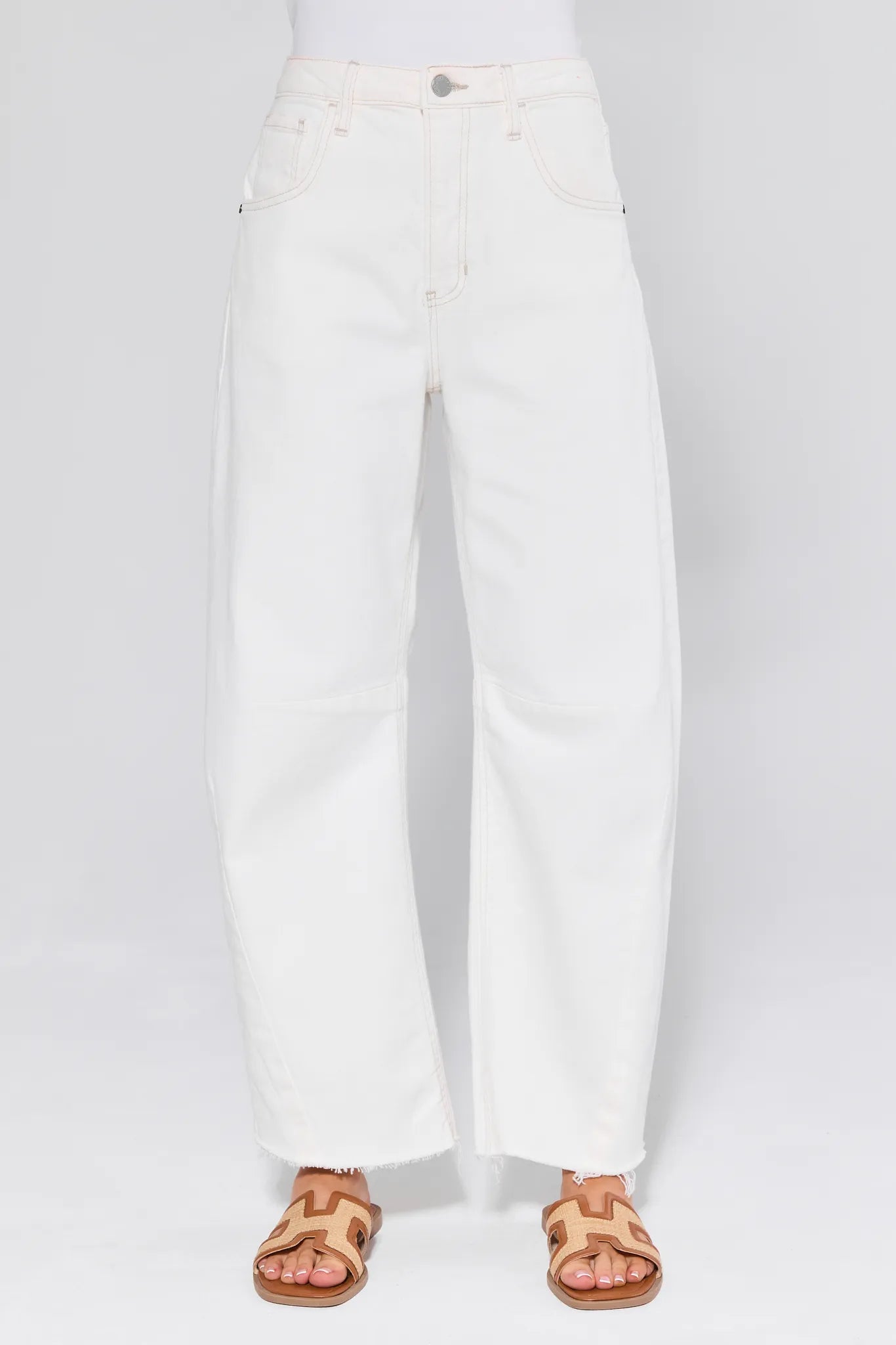 Blaine White Barrel Jeans worn by a person on a white background