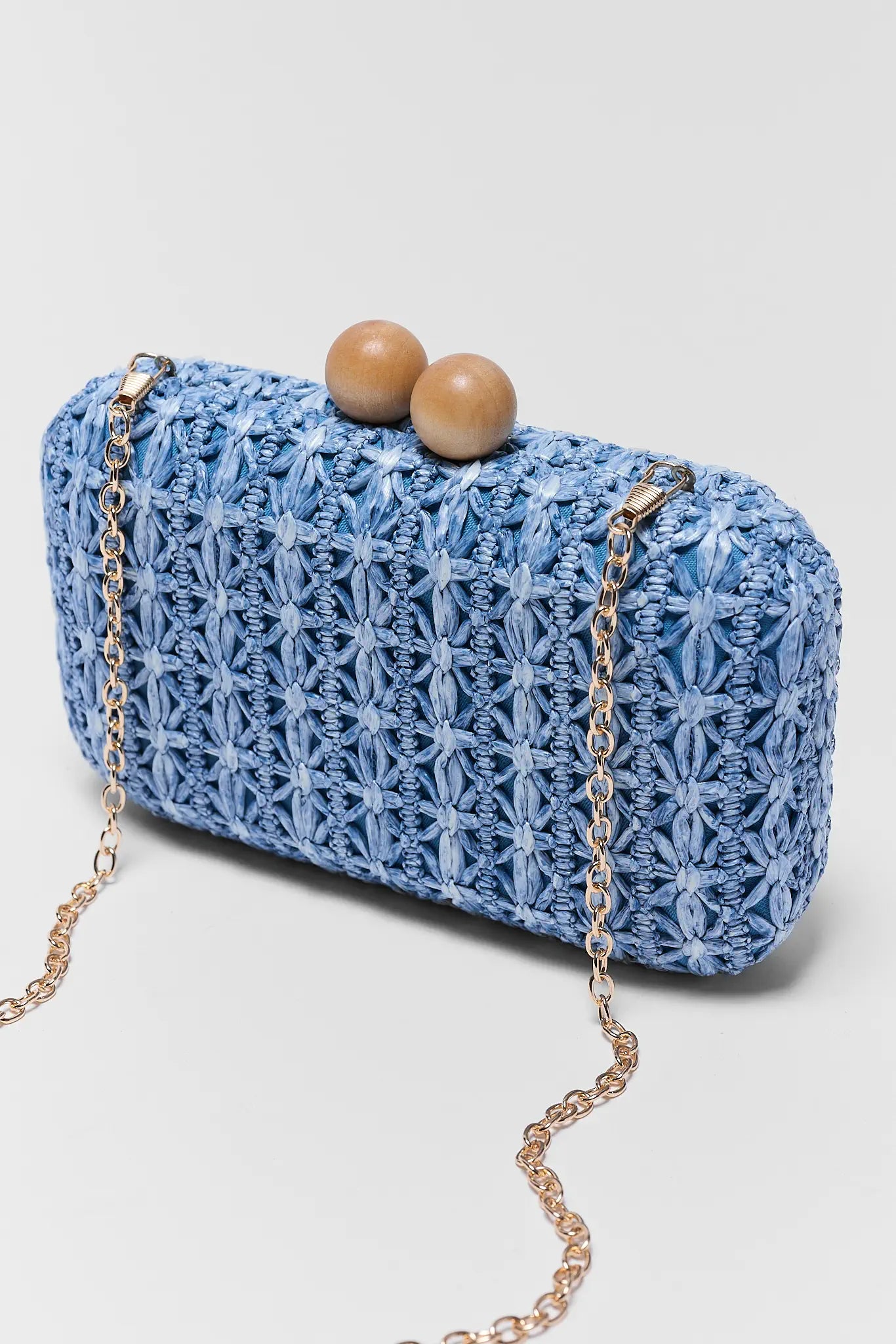 Martha Blue Woven Clutch on white background