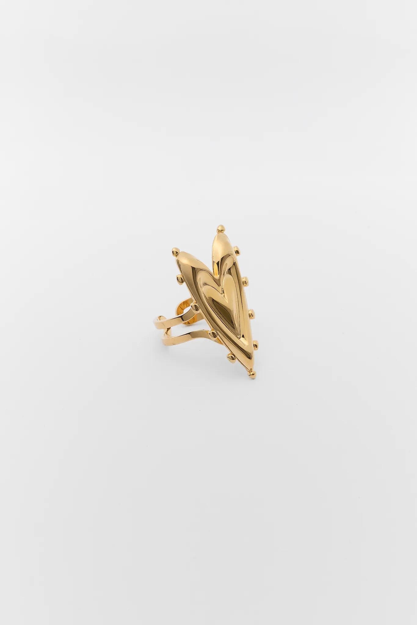 Gold ring with a unique design on a white background Vivana Gold Heart Ring