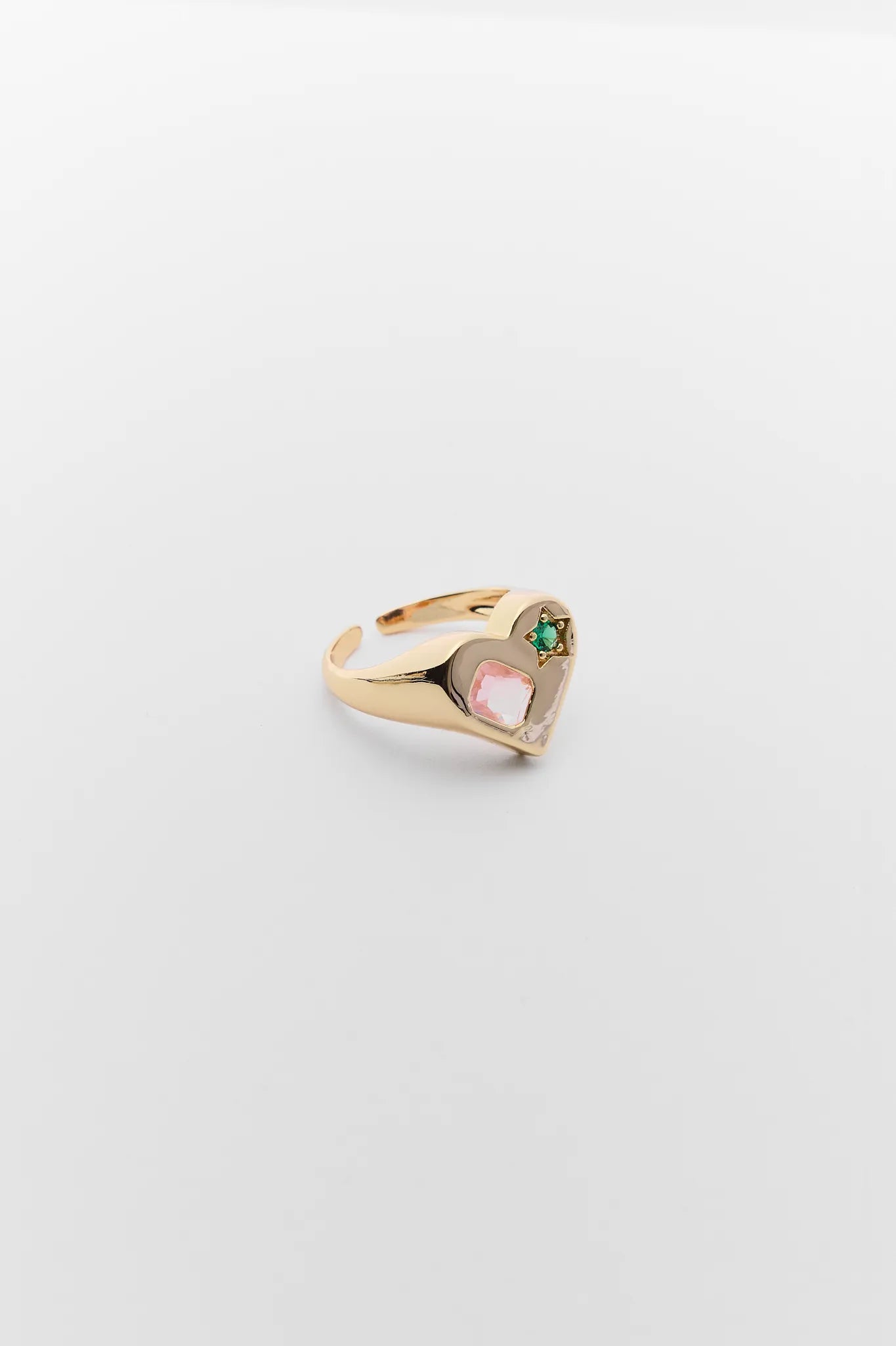 Gold ring with heart-shaped gemstones on a light gray background Renee Gold Multi Stone Heart Ring