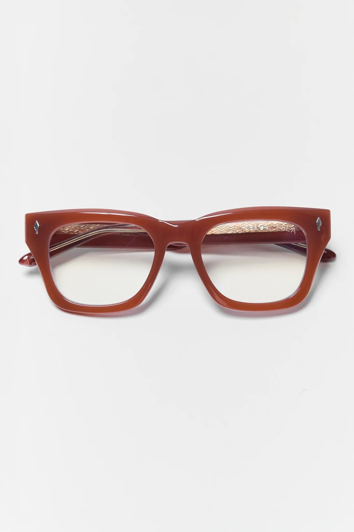 brown glasses on white background